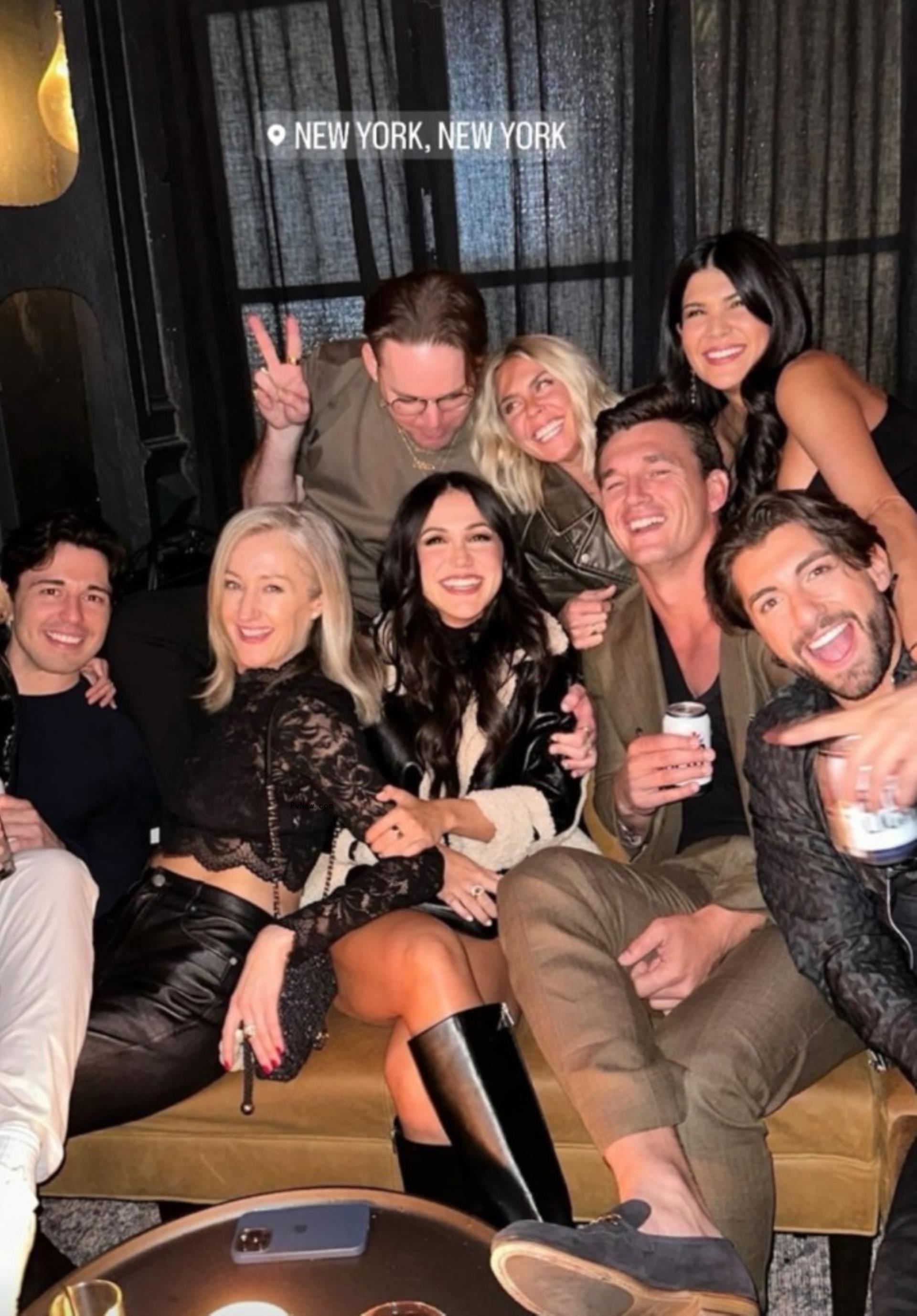 Kat Stickler in a group photo with Jason Tartick