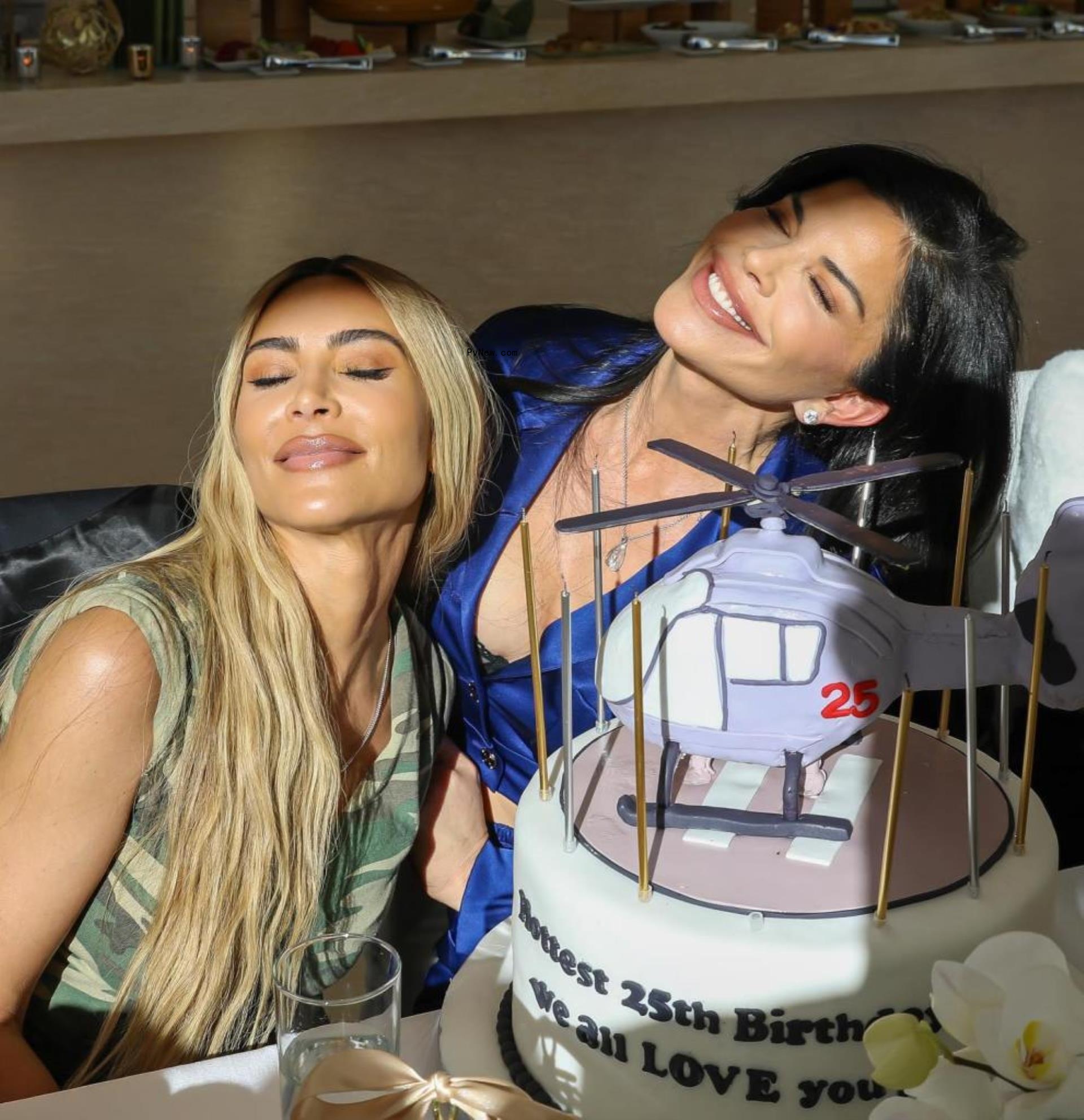 Lauren Sanchez, in red gown, holds hands with Jeff Bezos.