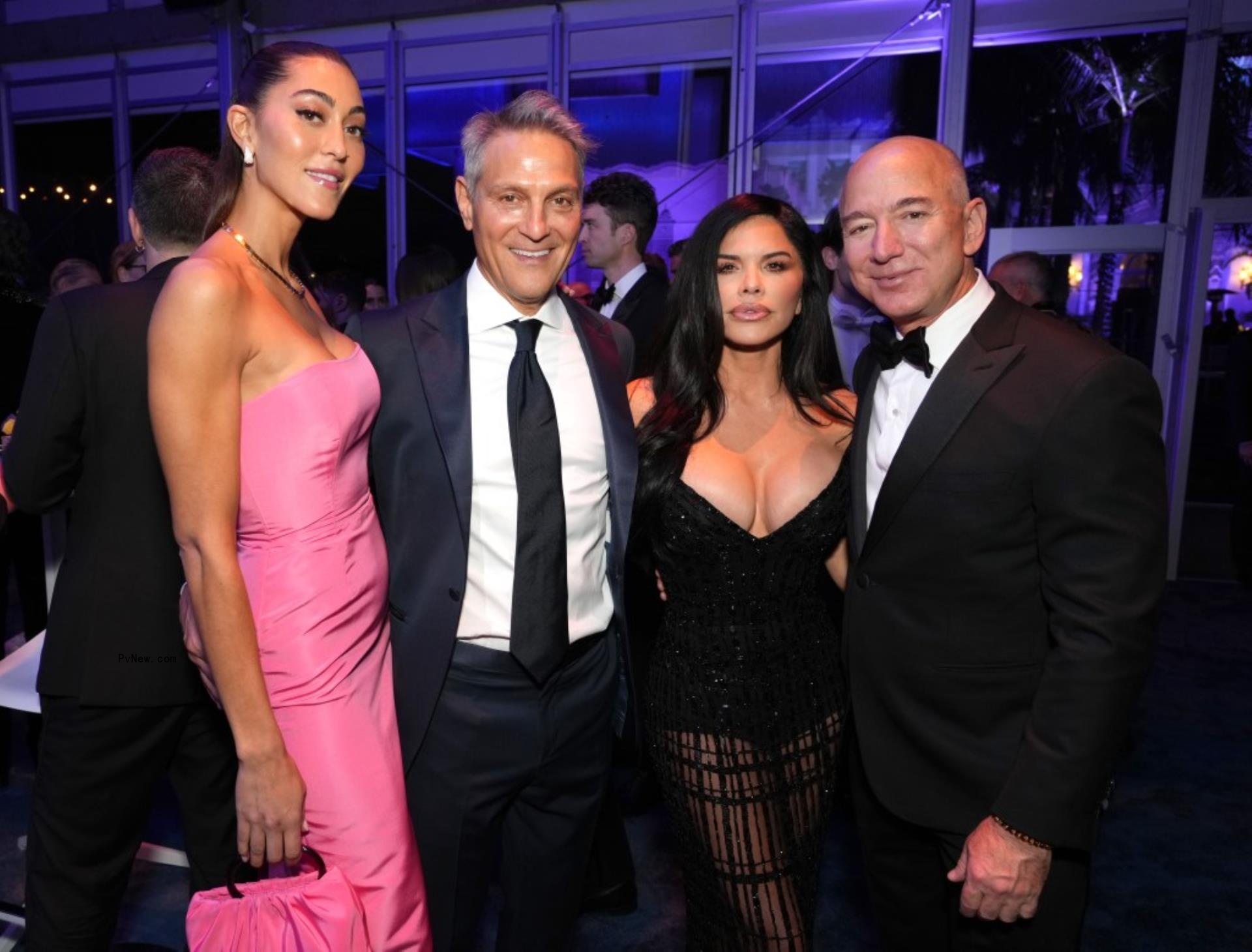 Sarah Staudinger stands next to Ari Emanuel, who's next to Lauren Sanchez and Jeff Bezos.