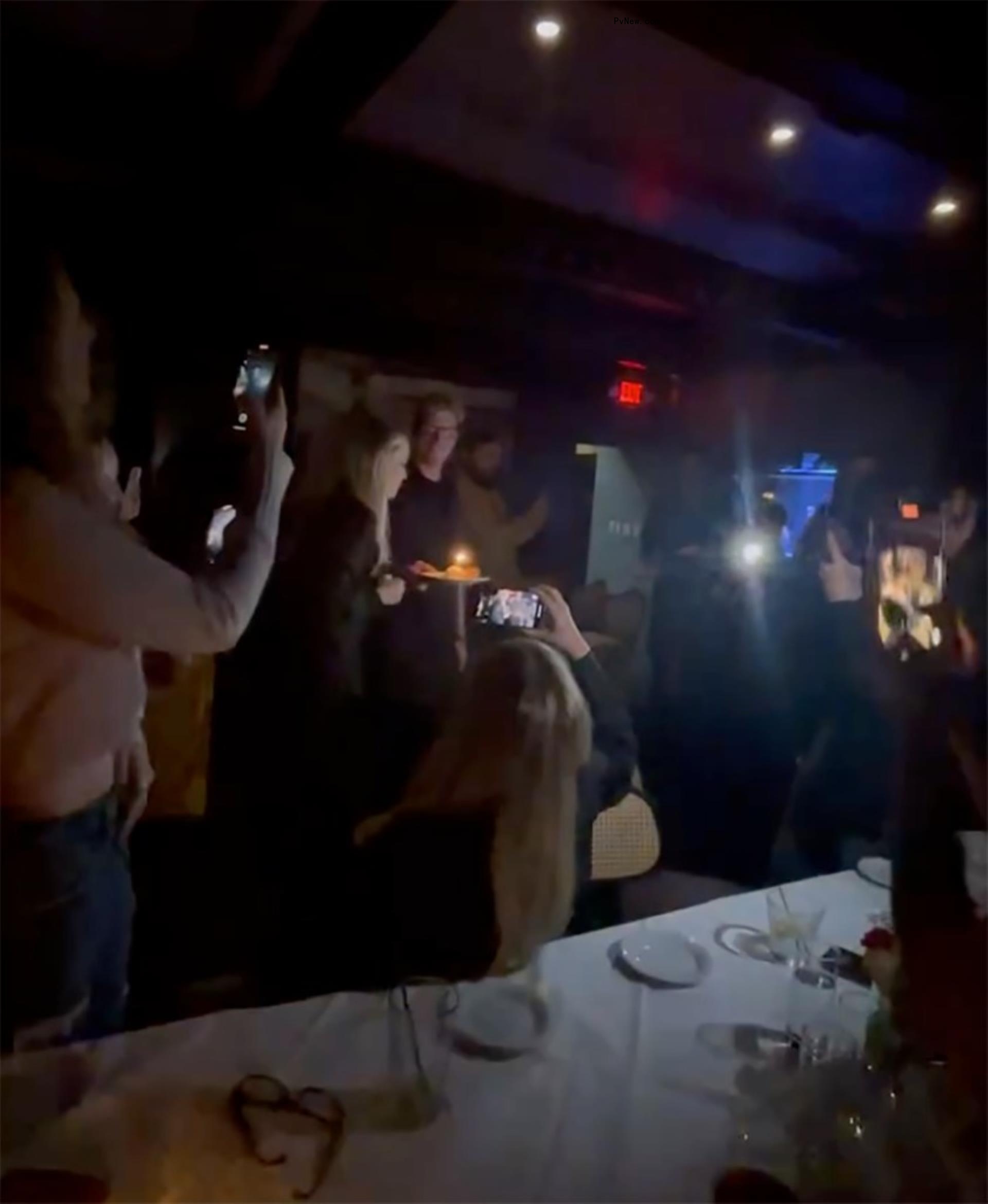 Kate Hudson blowing out her candle.