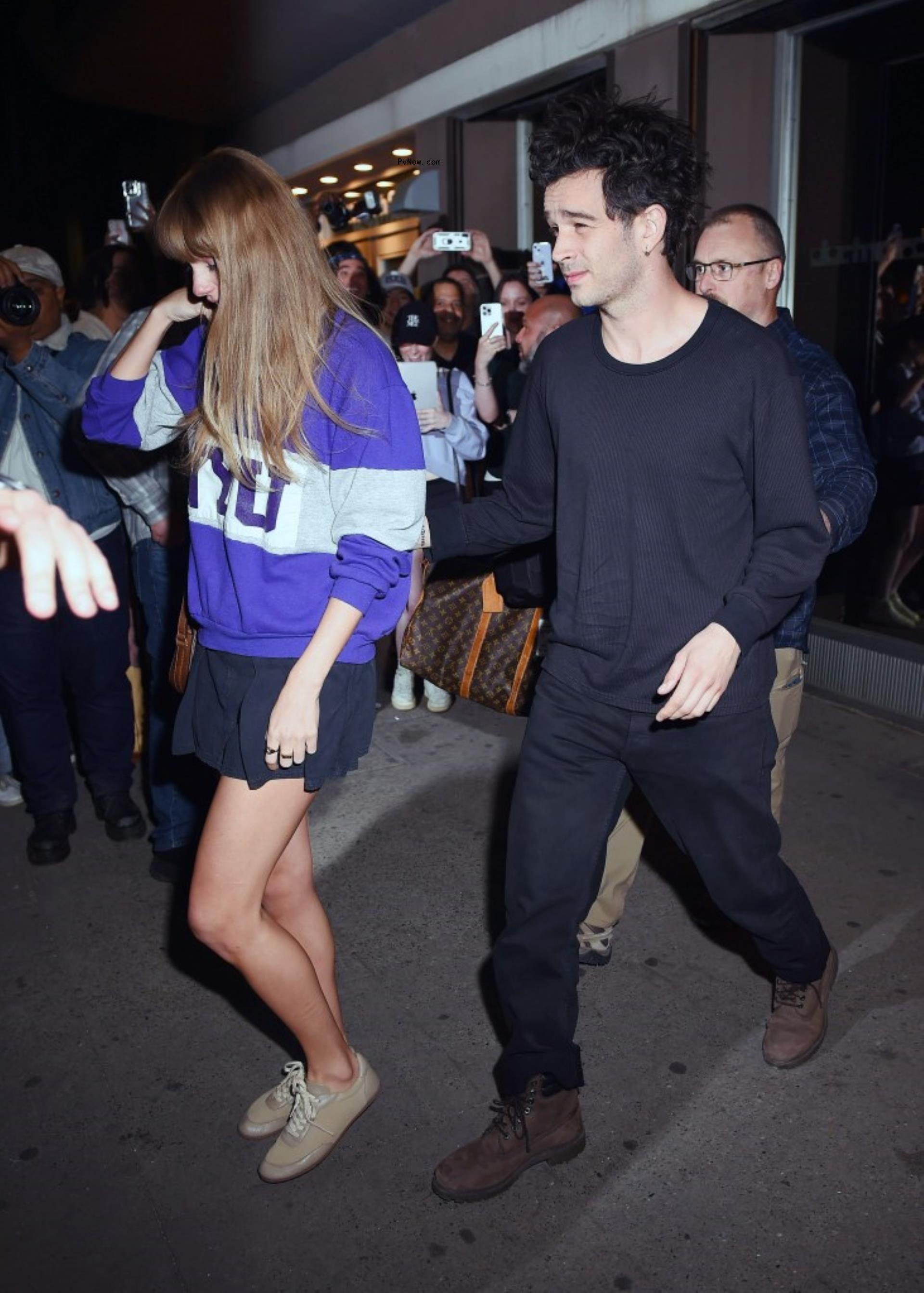 Taylor Swift and Matty Healy leaving the studio in May 2023.