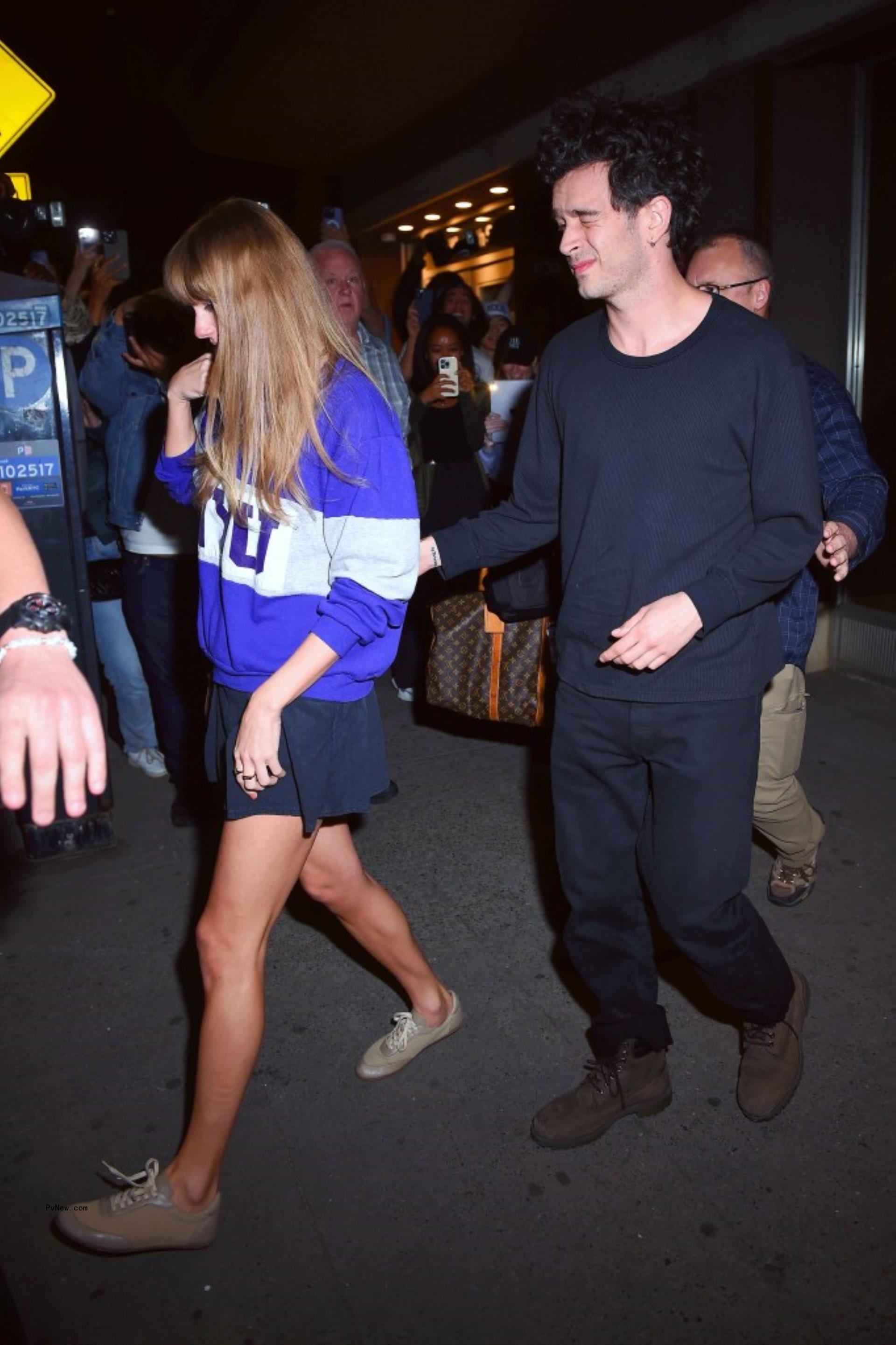 Taylor Swift and Matty Healy leaving the studio in May 2023.