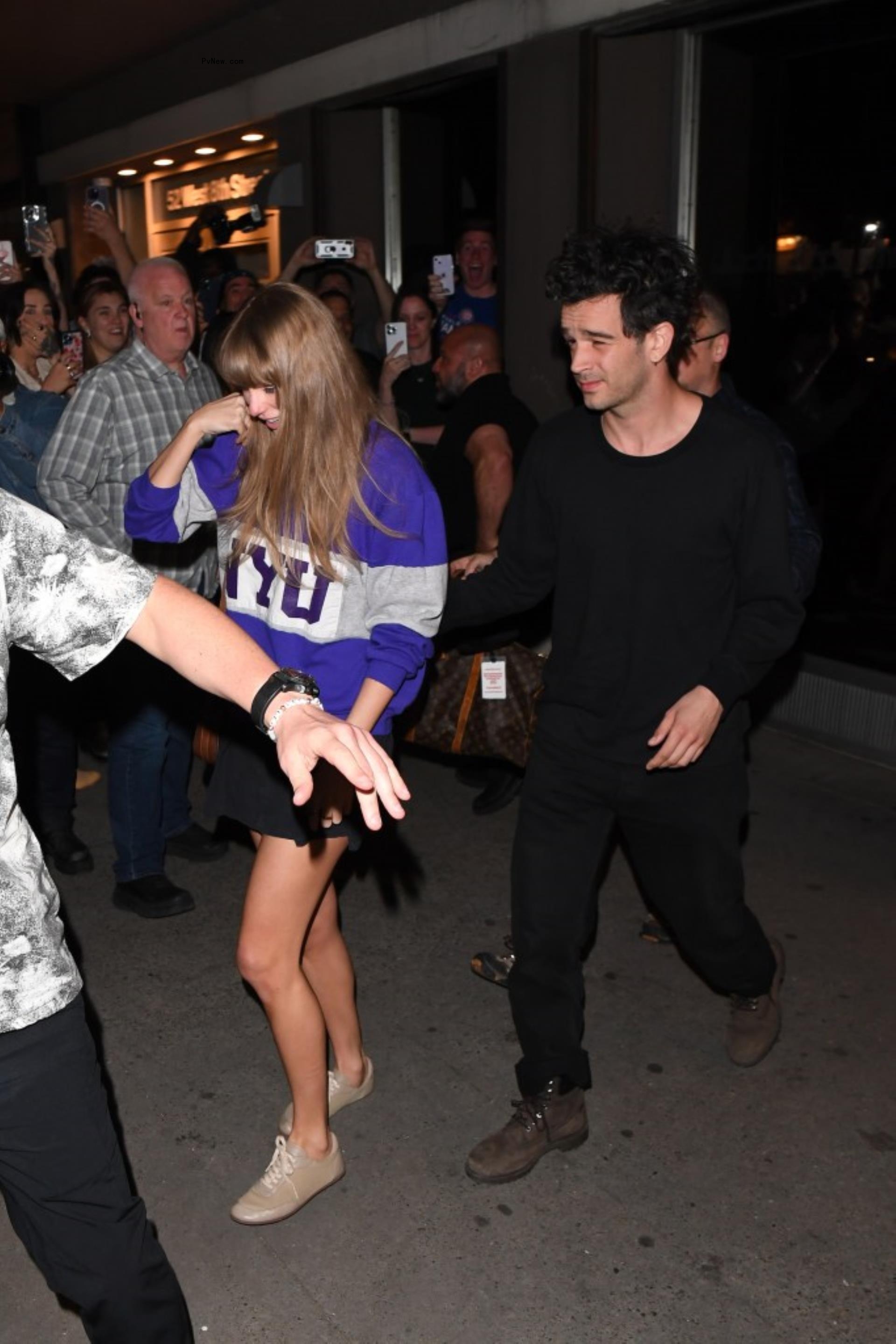 Taylor Swift and Matty Healy leaving the studio in May 2023.