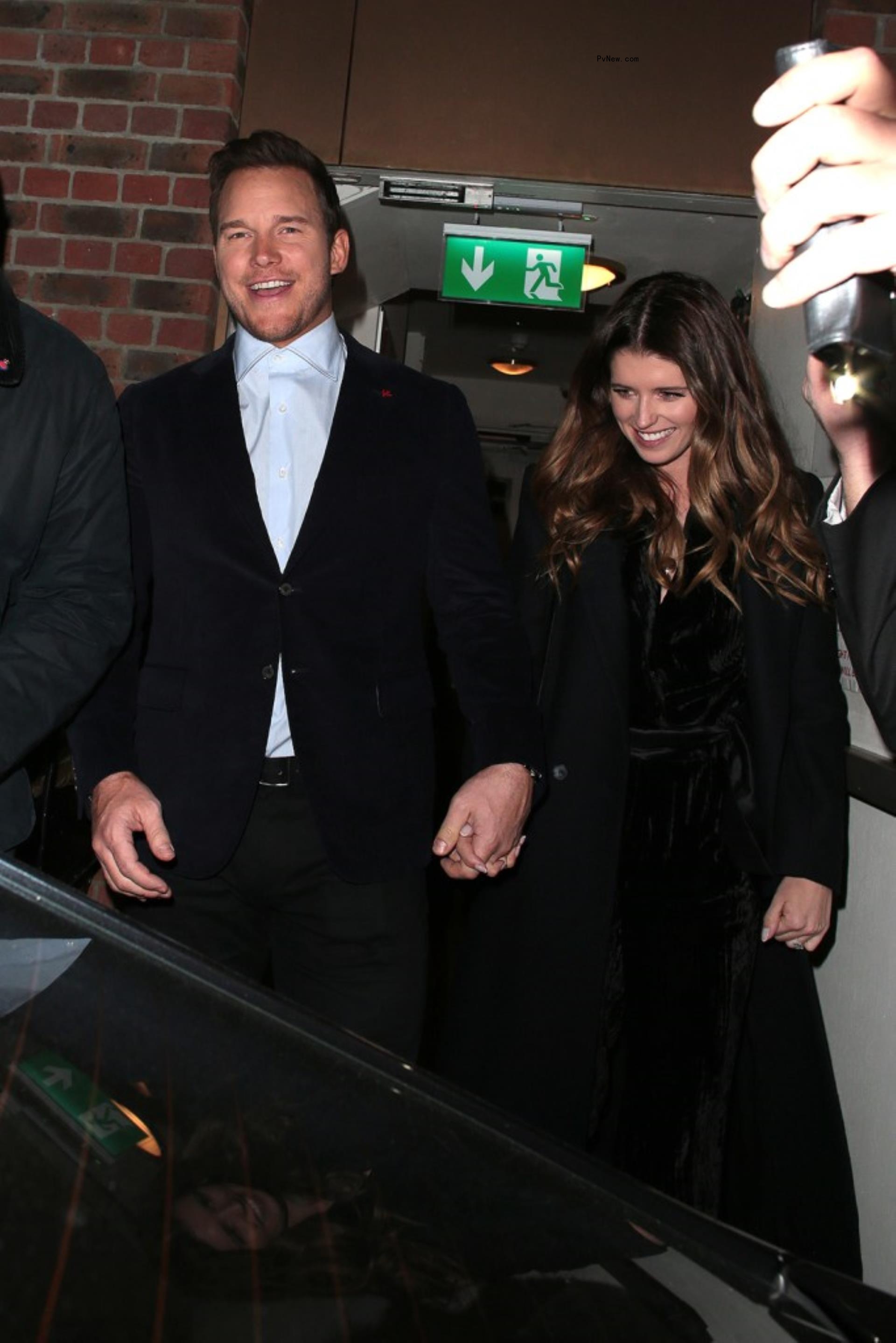 Katherine Schwarzenegger and Chris Pratt holding hands. 