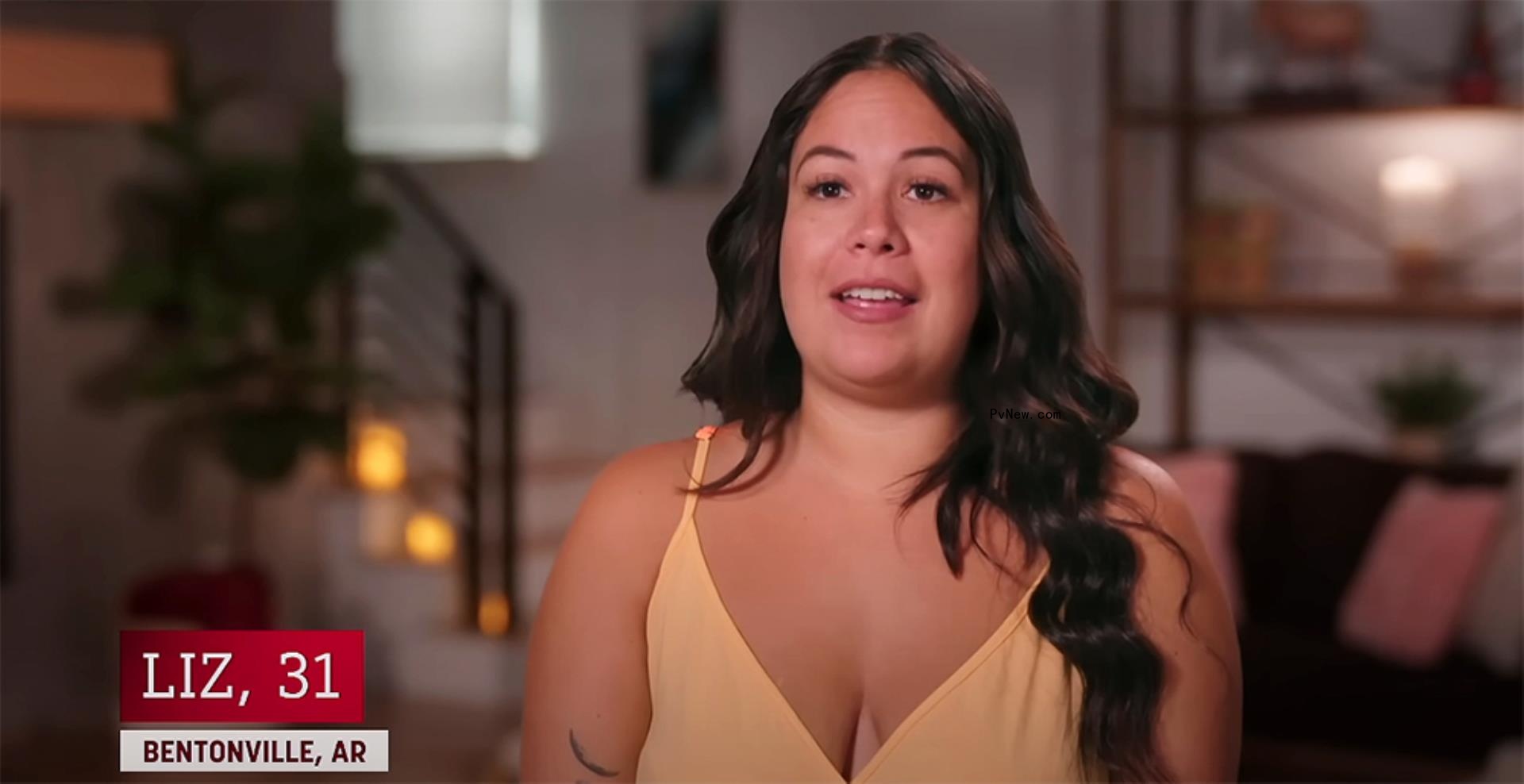 Liz Woods talking in a confessional