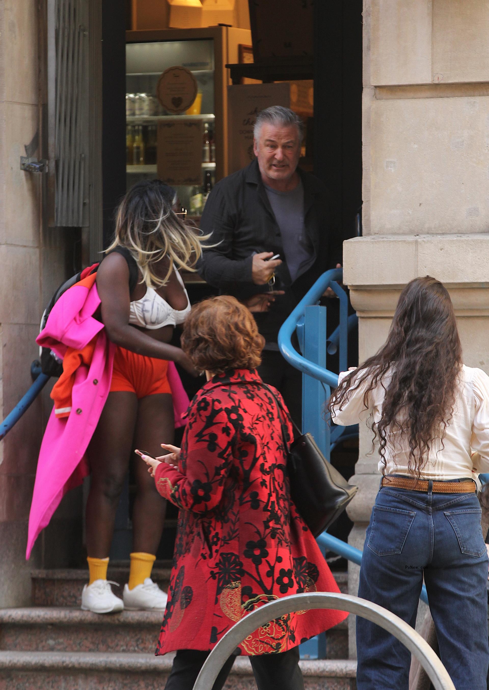 alec baldwin tussling with a woman