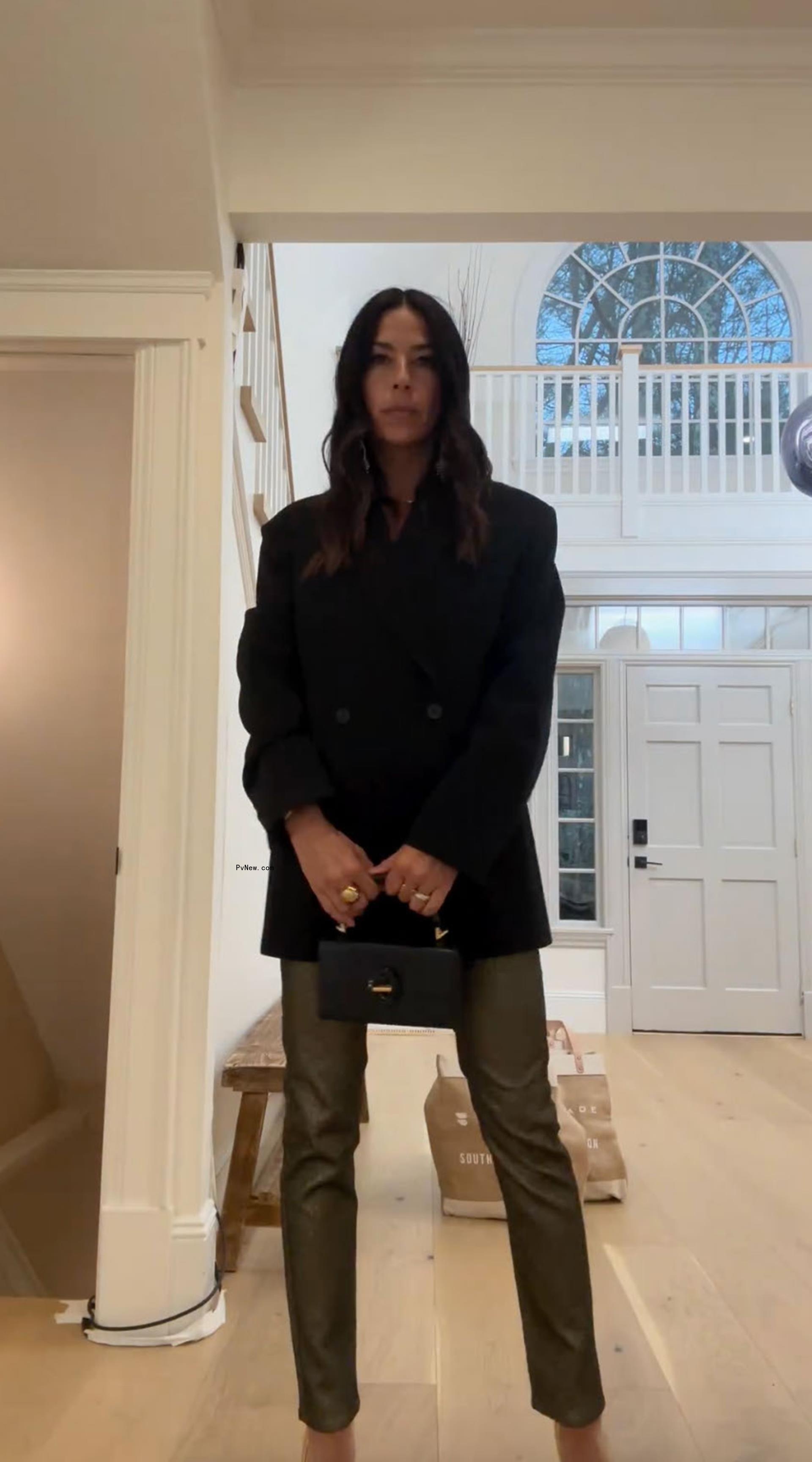 Rebecca Minkoff posing for a photo