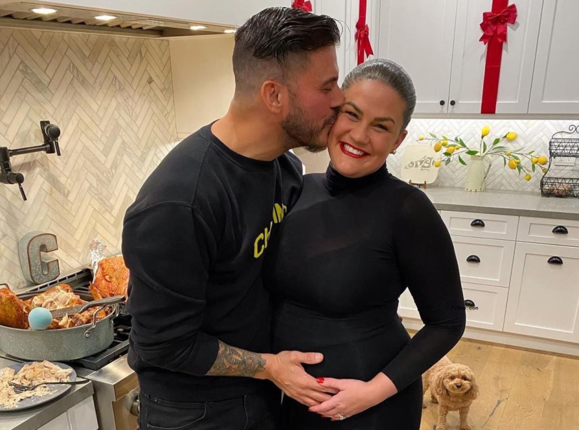 pregnant Brittany Cartwright smiling with Jax Taylor