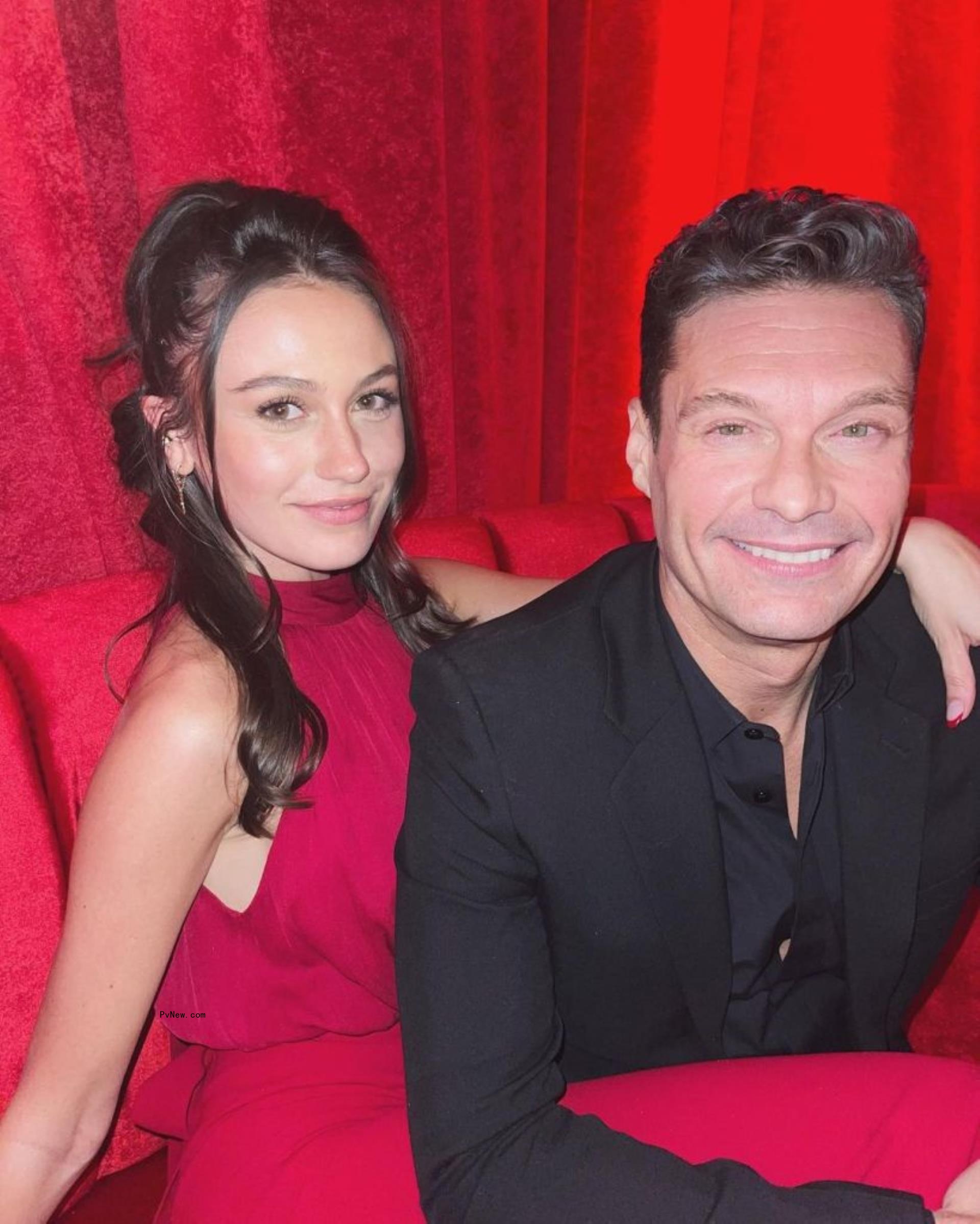 Aubrey Paige and Ryan Seacrest at an event.
