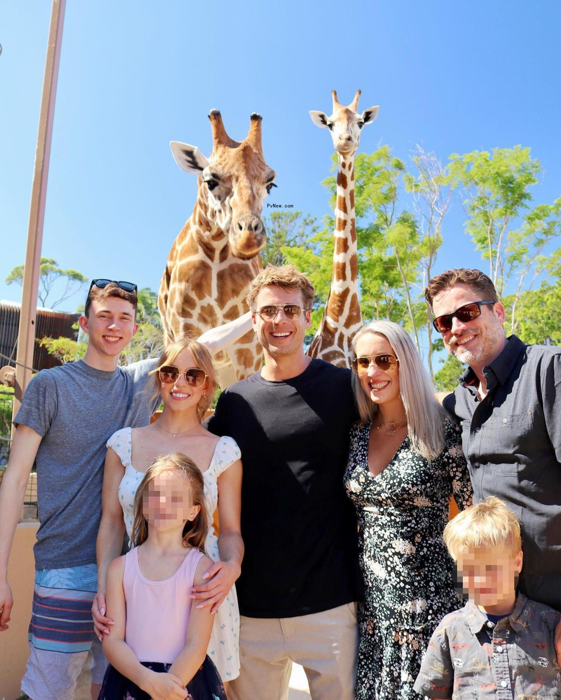 Glen Powell, his family and Sydney Sweeney at the zoo in Sydney.
