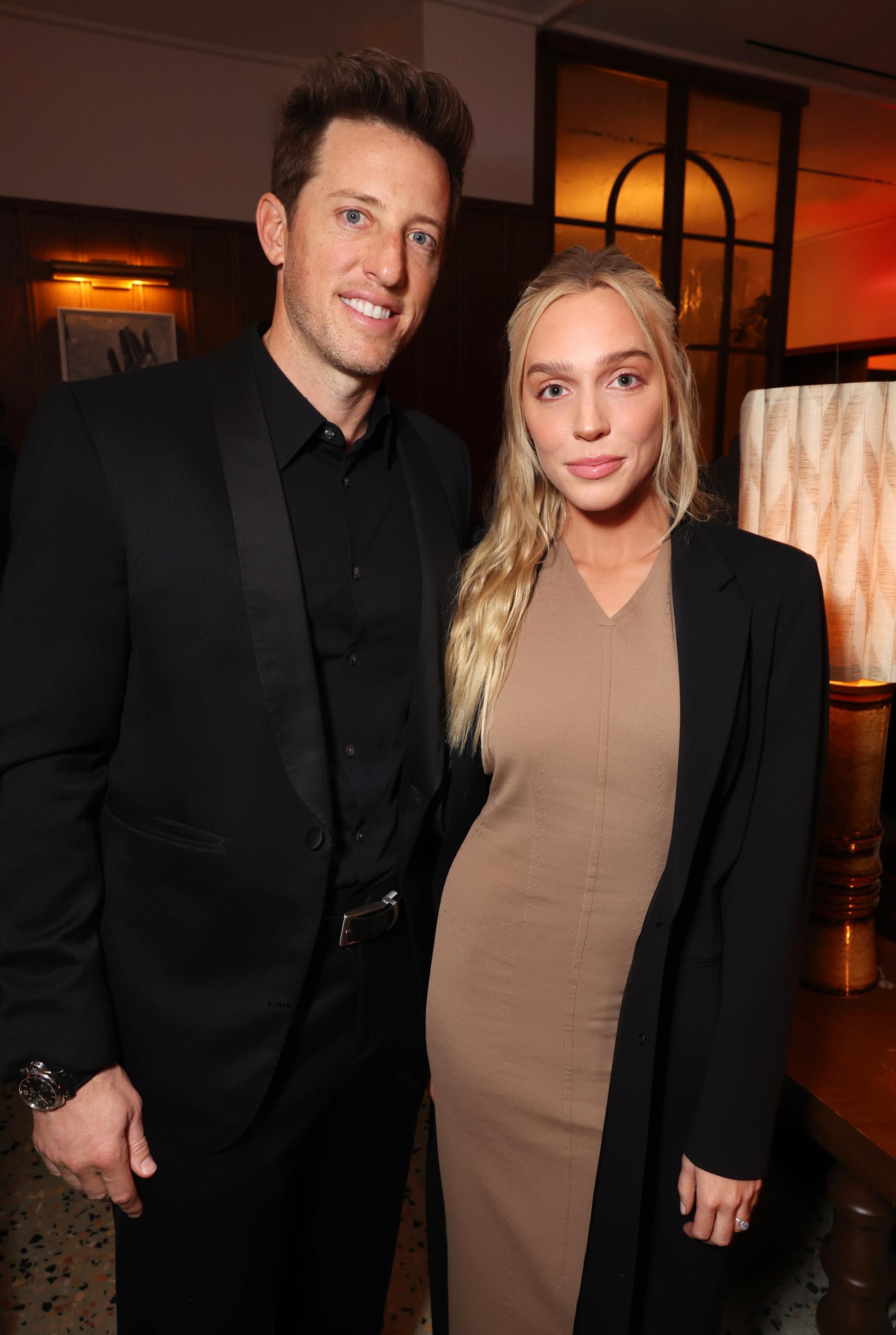 Matt Kaplan and Alex Cooper posing together