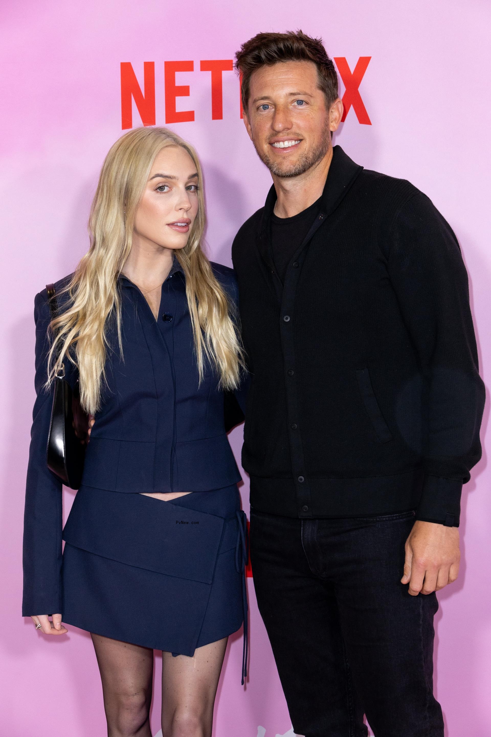 Alex Cooper and Matt Kaplan posing together