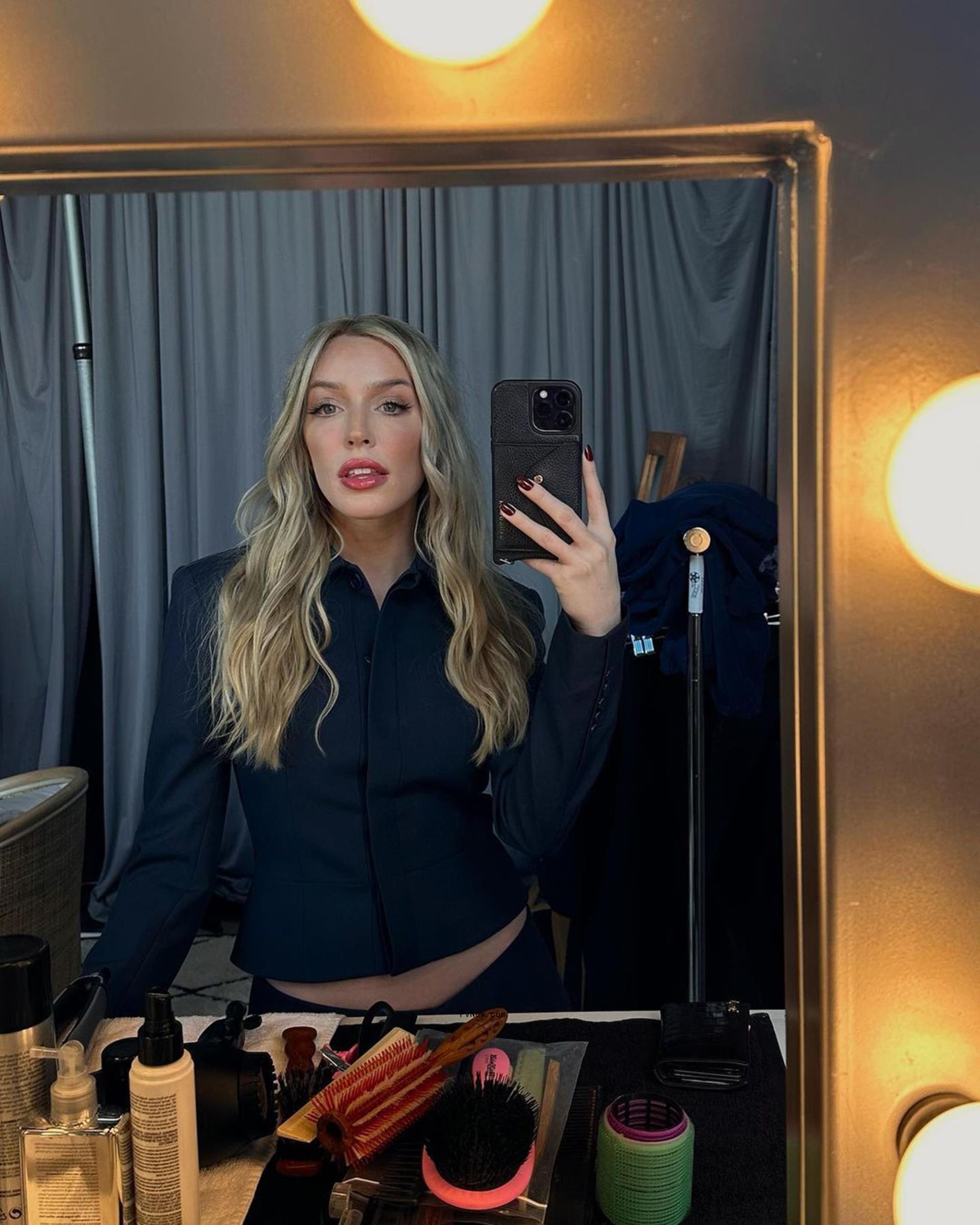 A mirror selfie of Alex Cooper