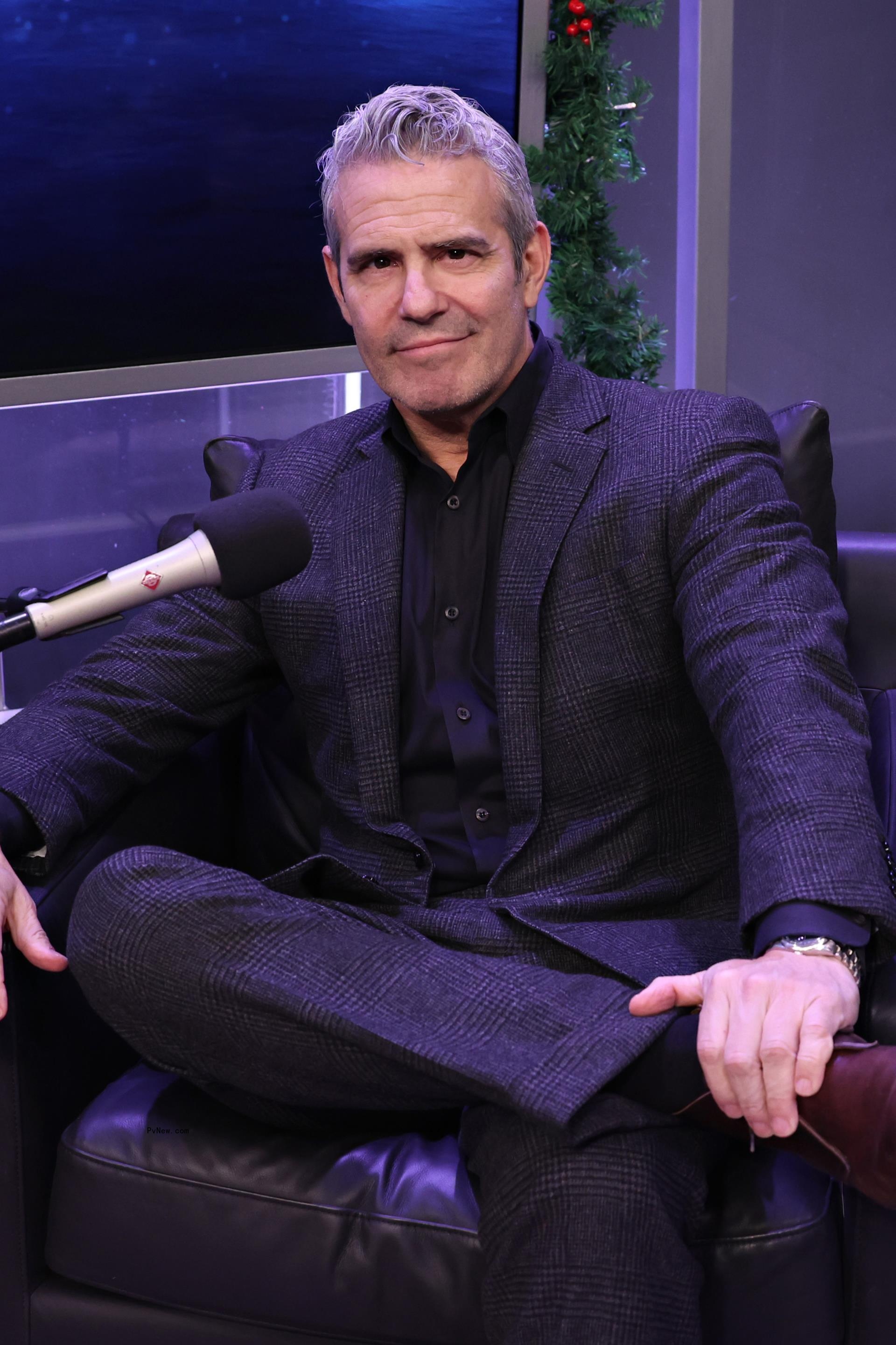 Andy Cohen sitting