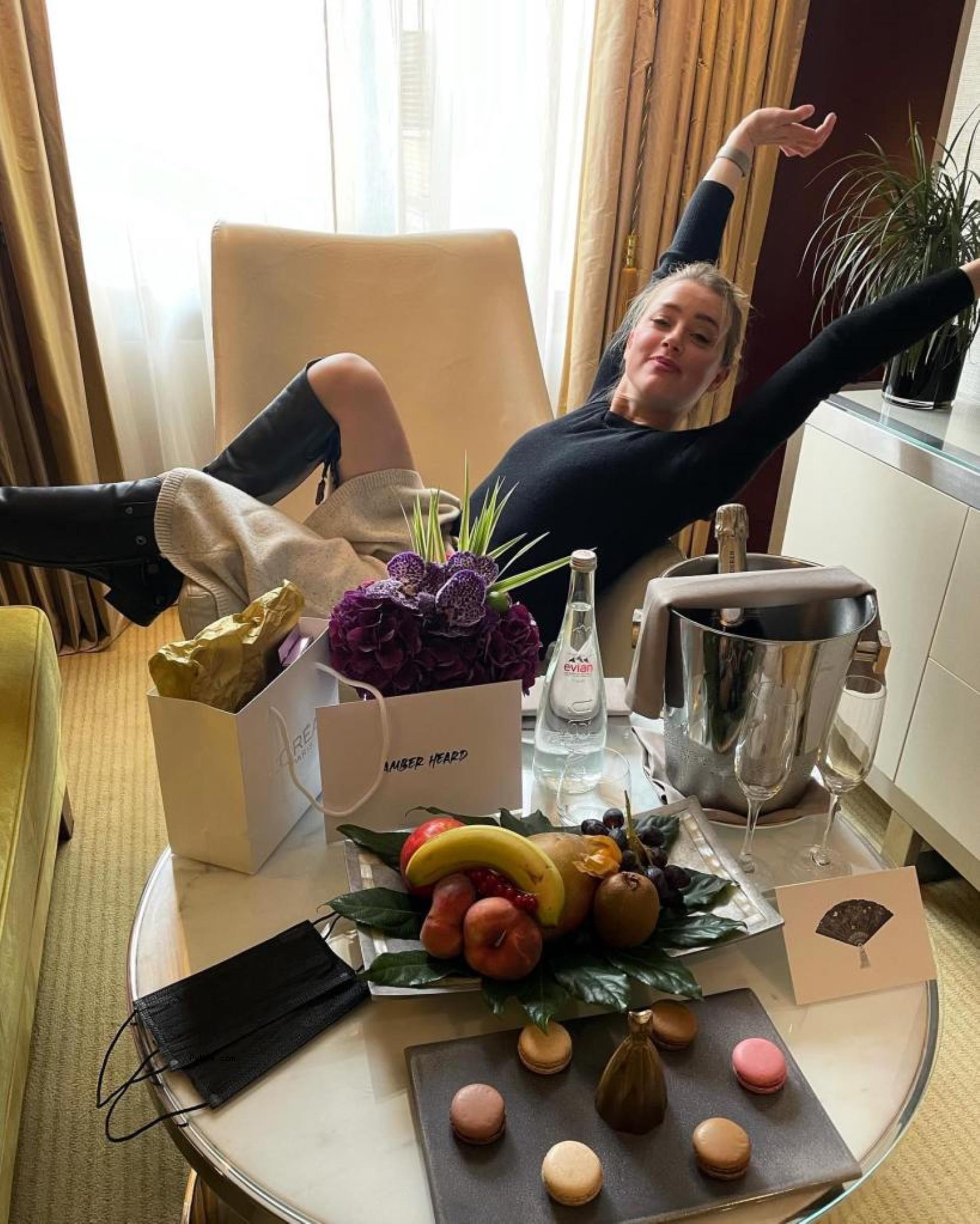 Amber Heard with Champagne.