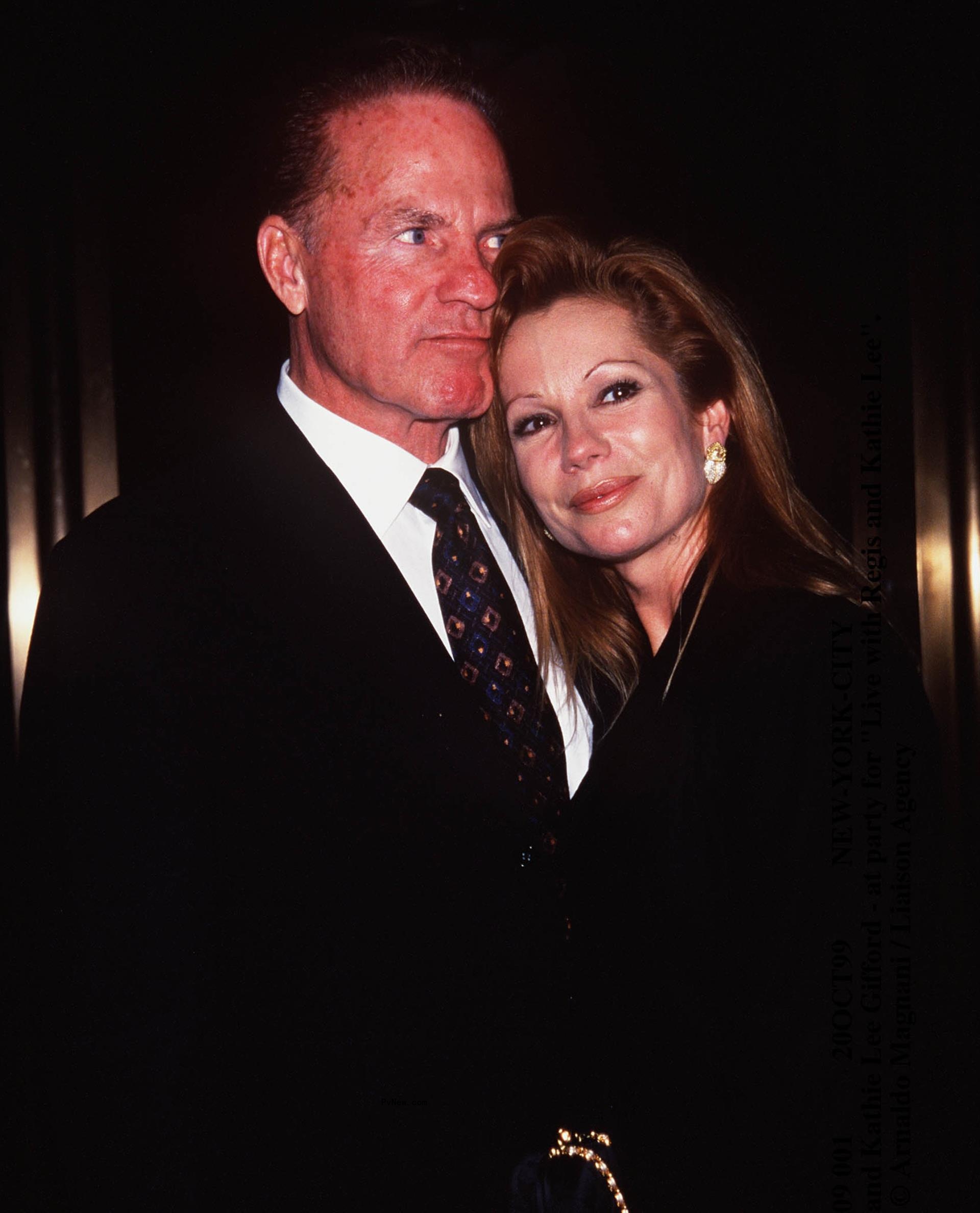 Frank Gifford posing with Kathie Lee Gifford