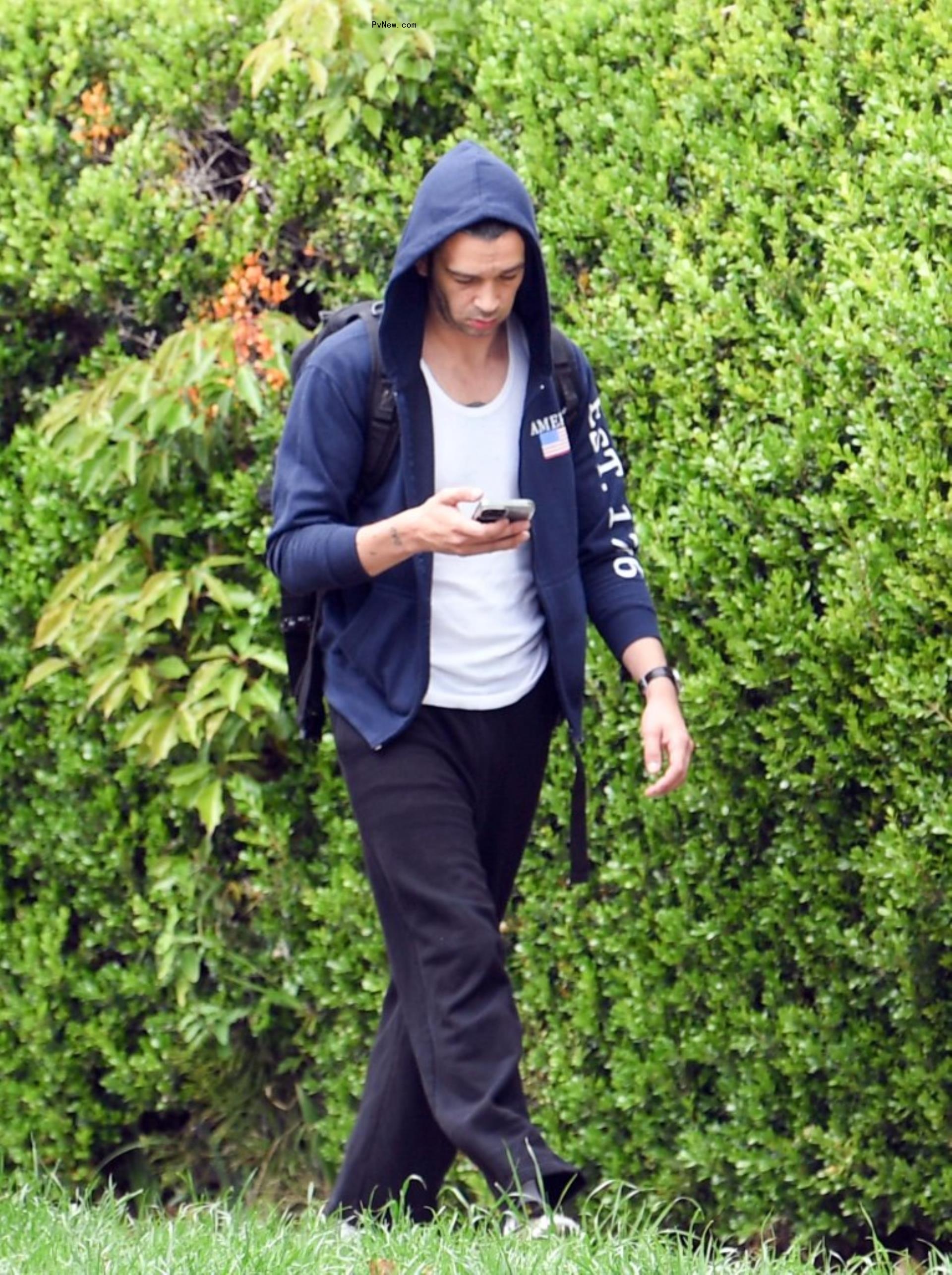 Matty Healy walking