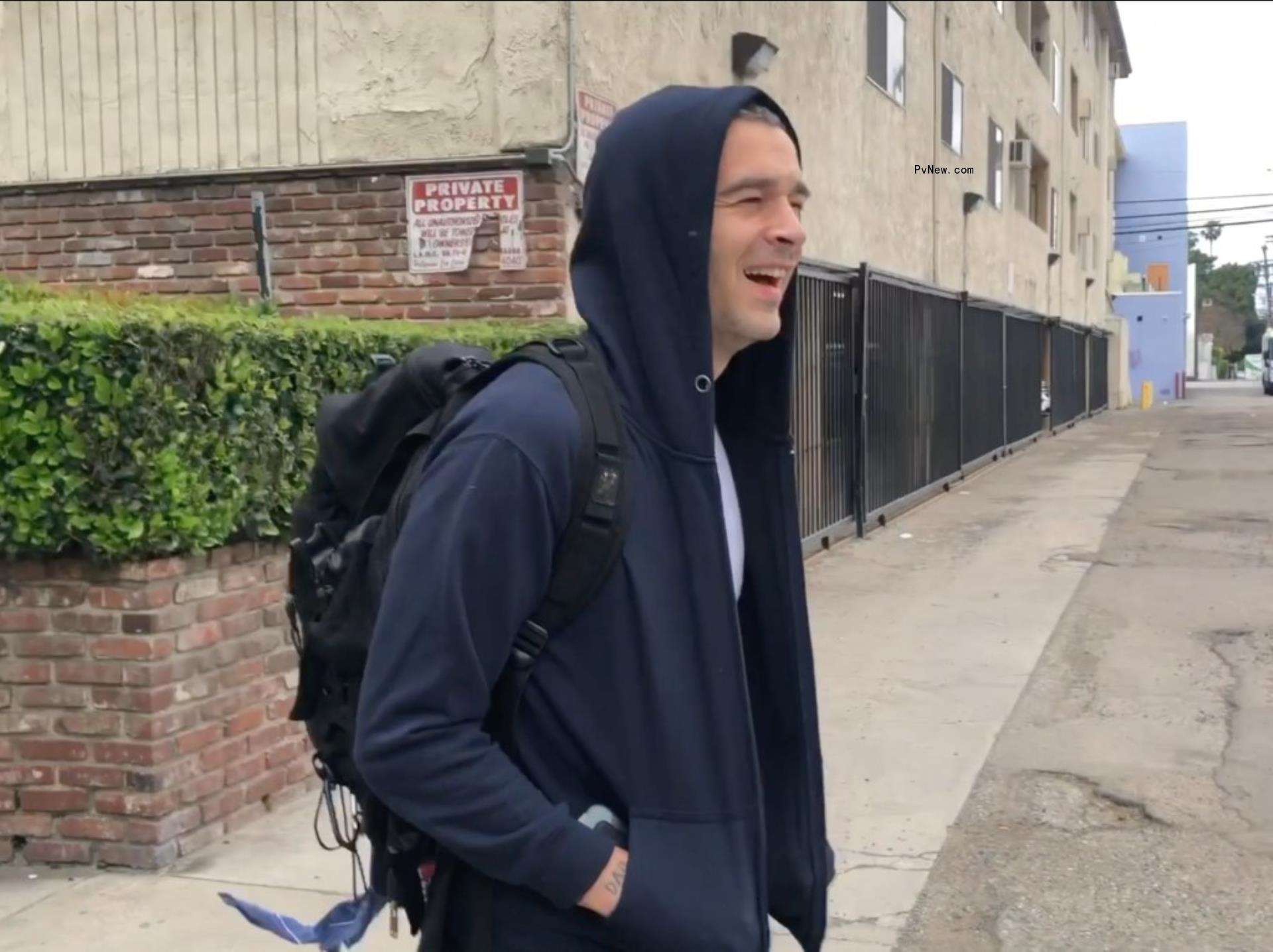 Matty Healy walking and talking