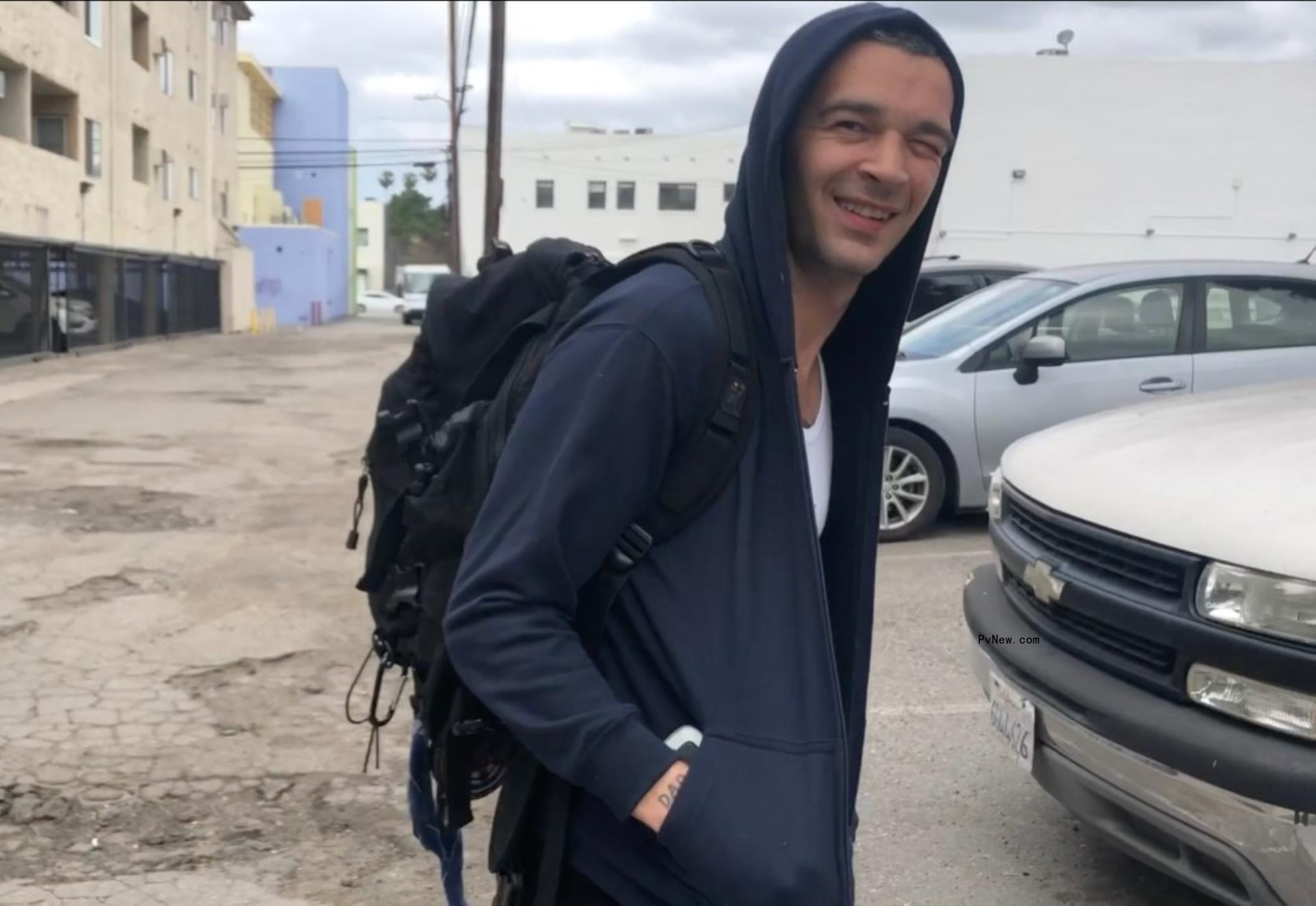 Matty Healy walking and talking