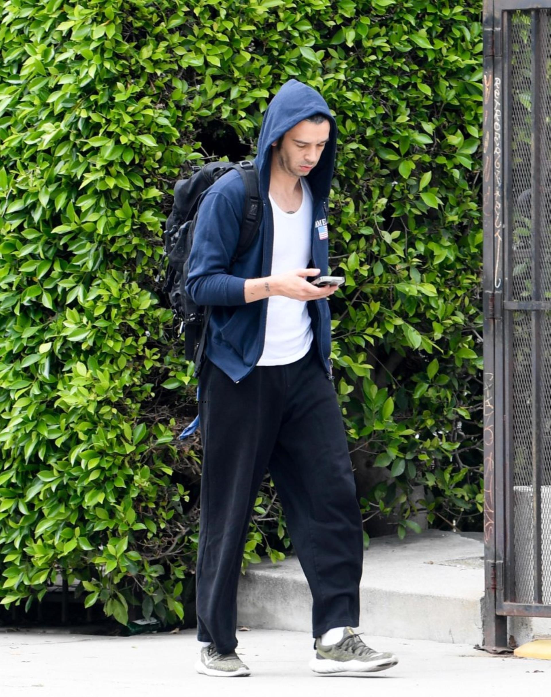 Matty Healy walking