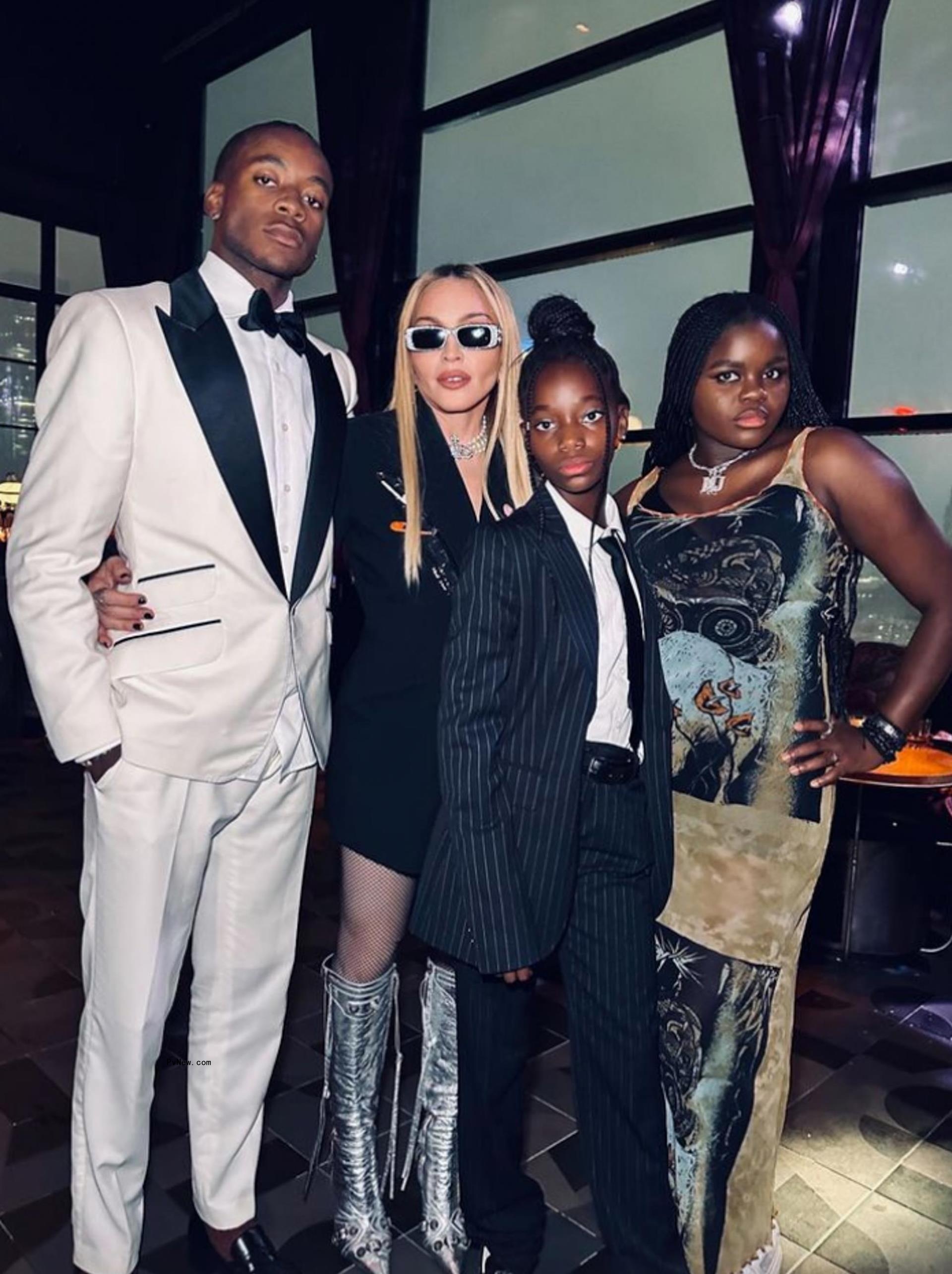 Mado<i></i>nna with her kids