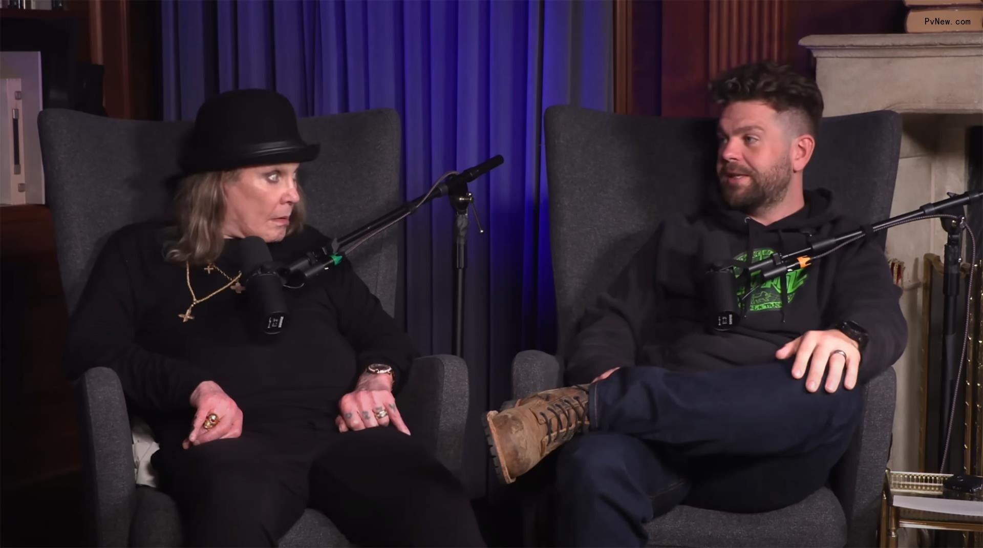 Ozzy and Jack Osbourne sitting