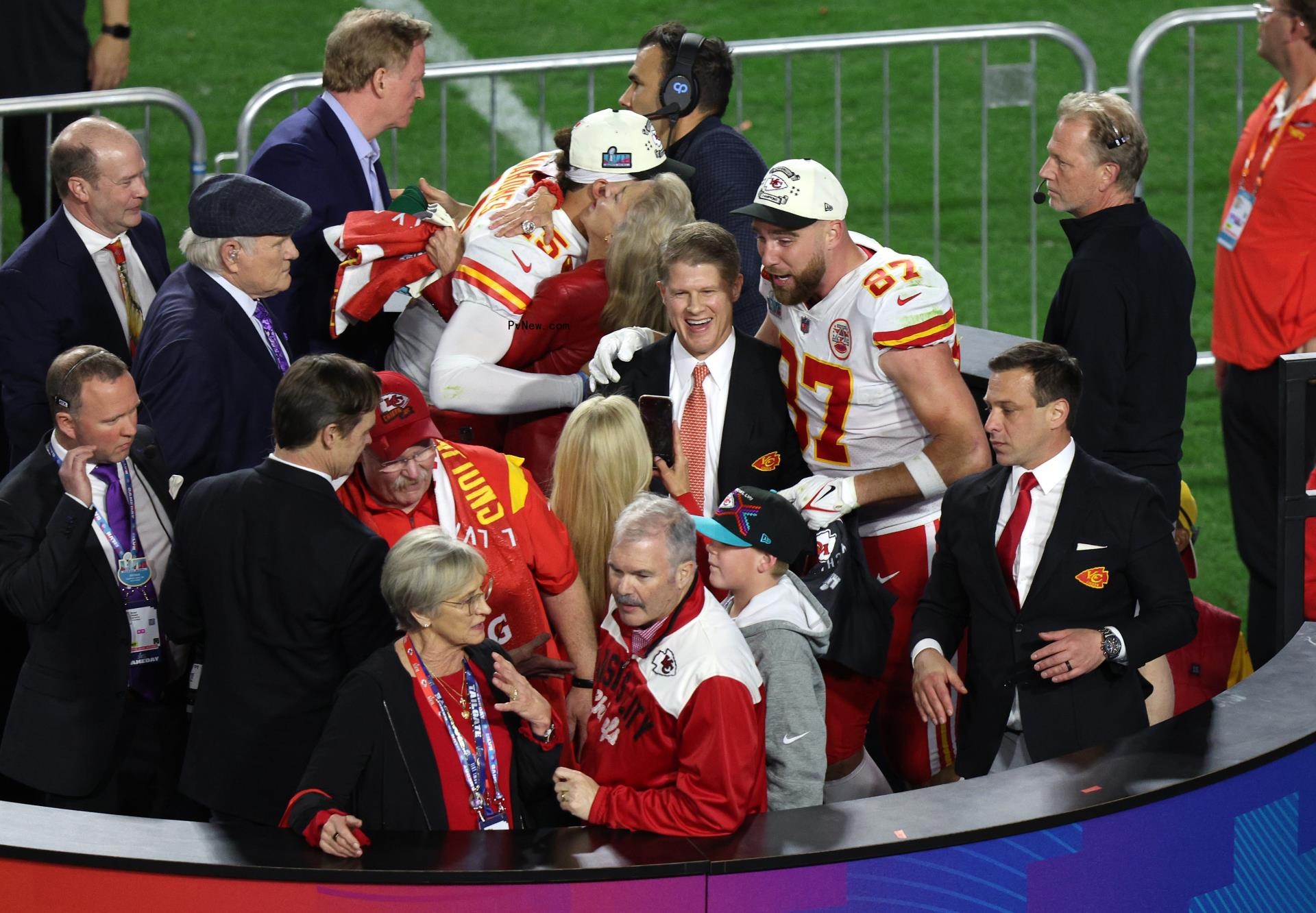 The Hunt family on a football field after a game.