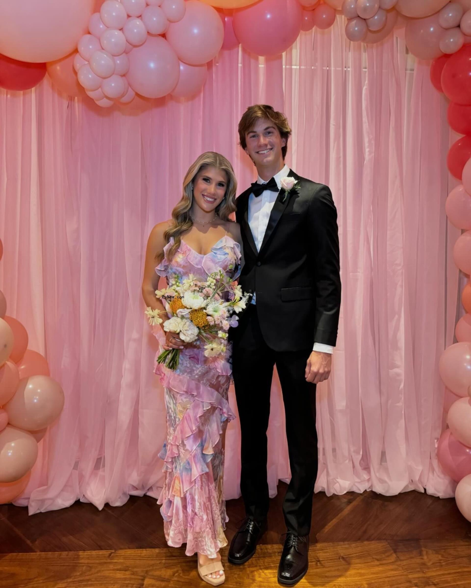 Ava Hunt and a young man at a formal.