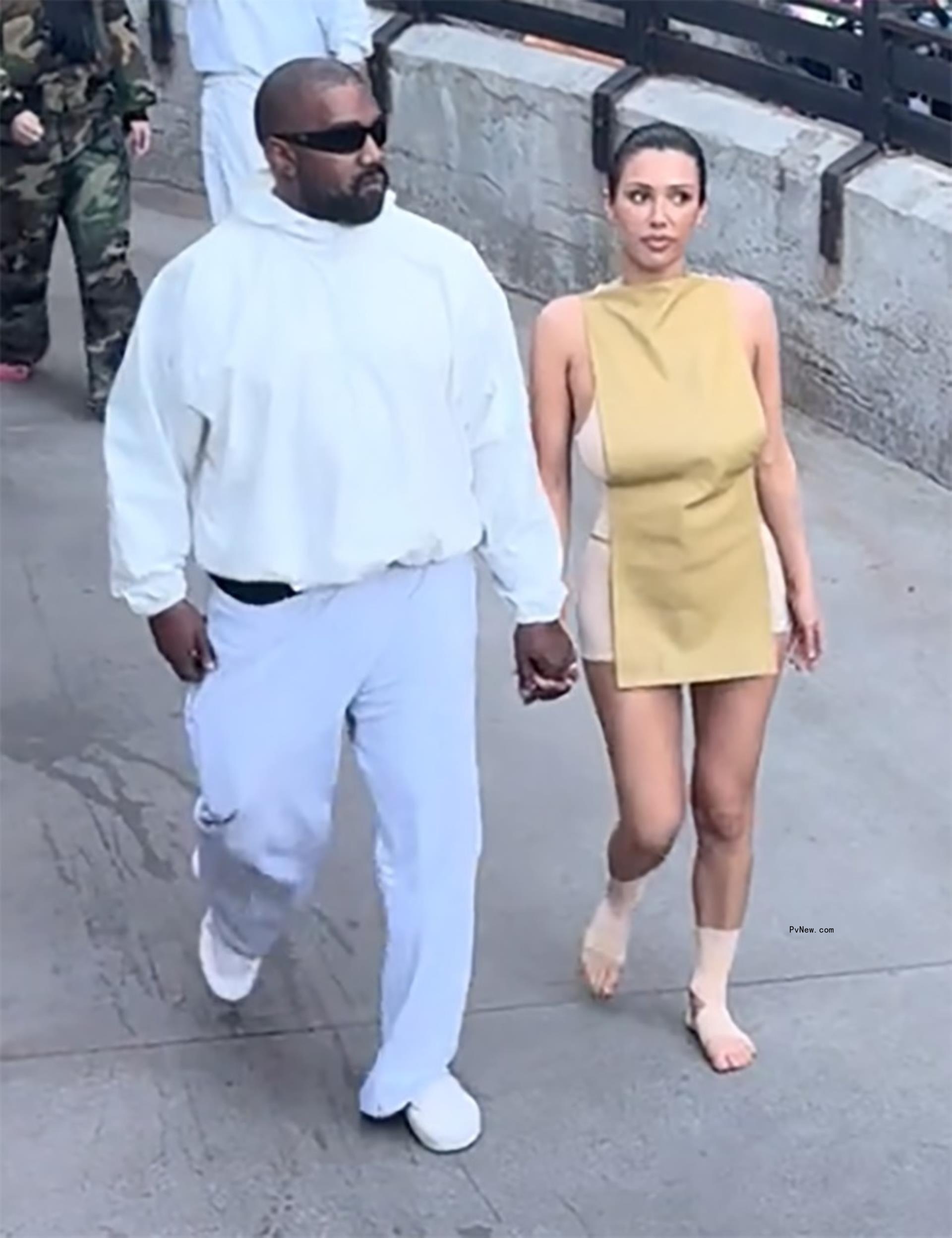 kanye west and bianca censori holding hands