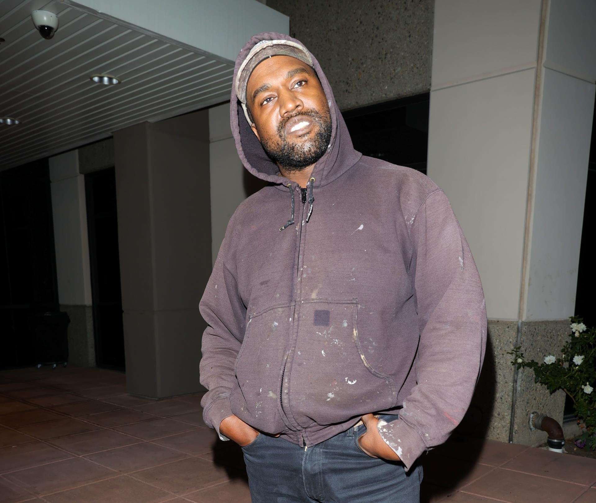 Kanye West smiling.