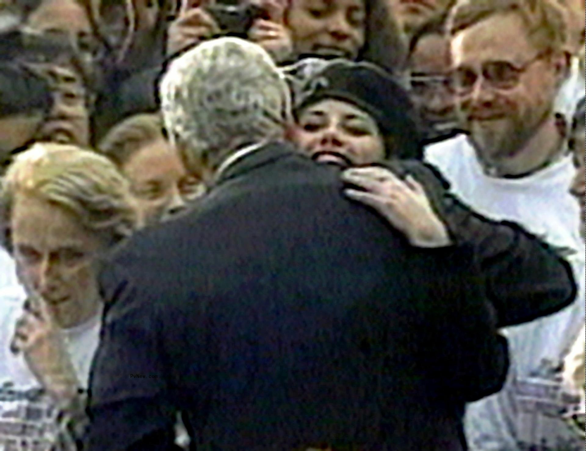 Mo<i></i>nica Lewinsky embraces President Clinton