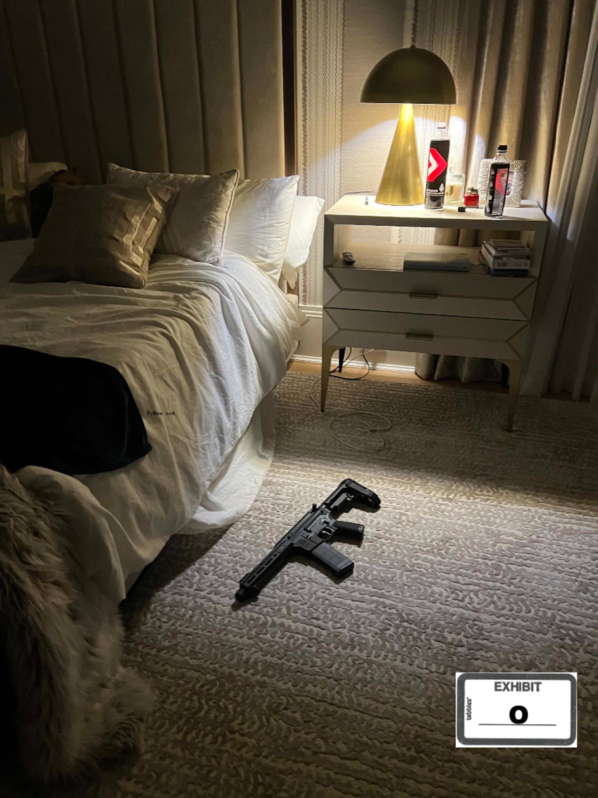 A gun on the floor in Jeezy's home.