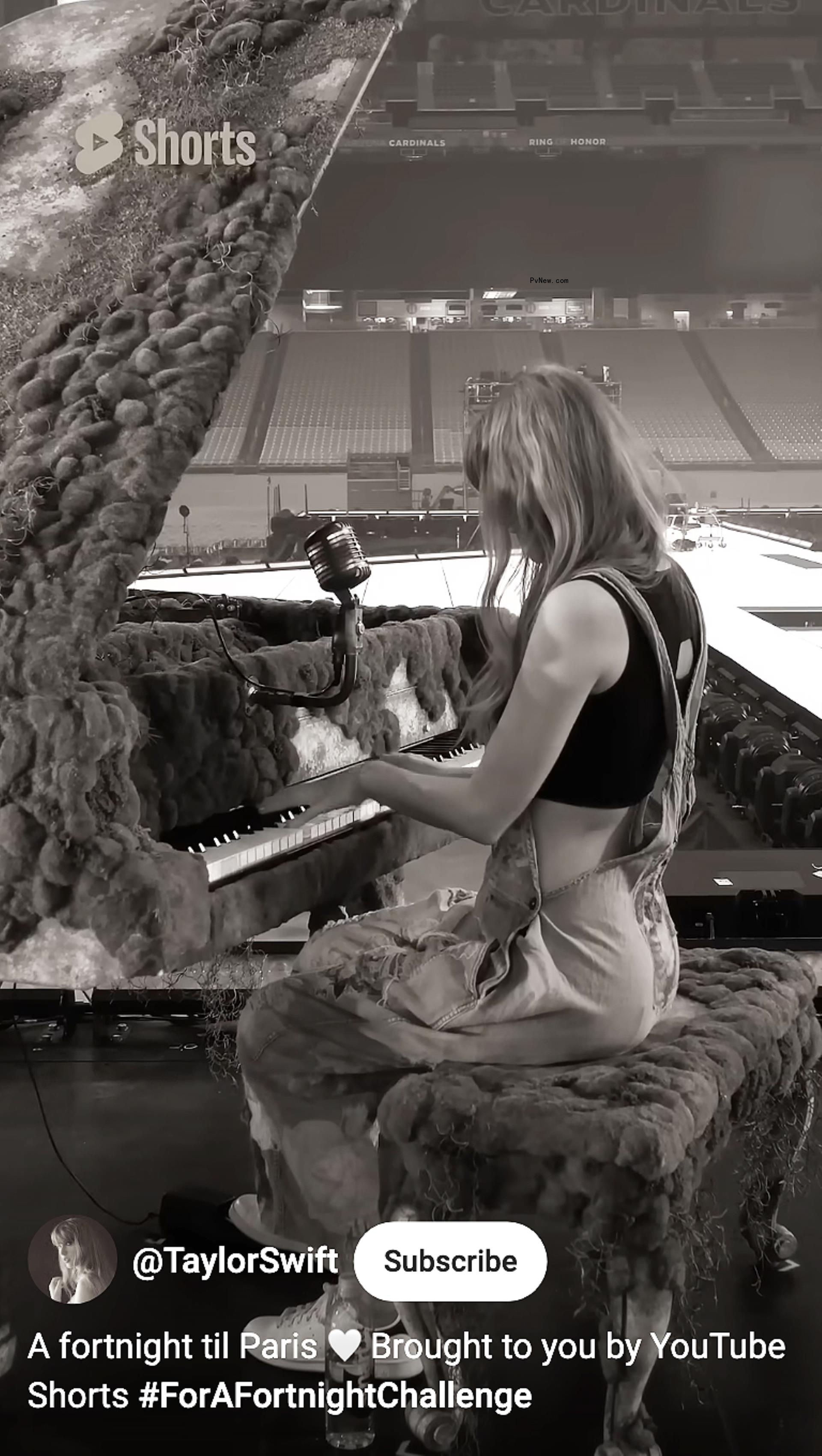 Taylor Swift playing the piano.