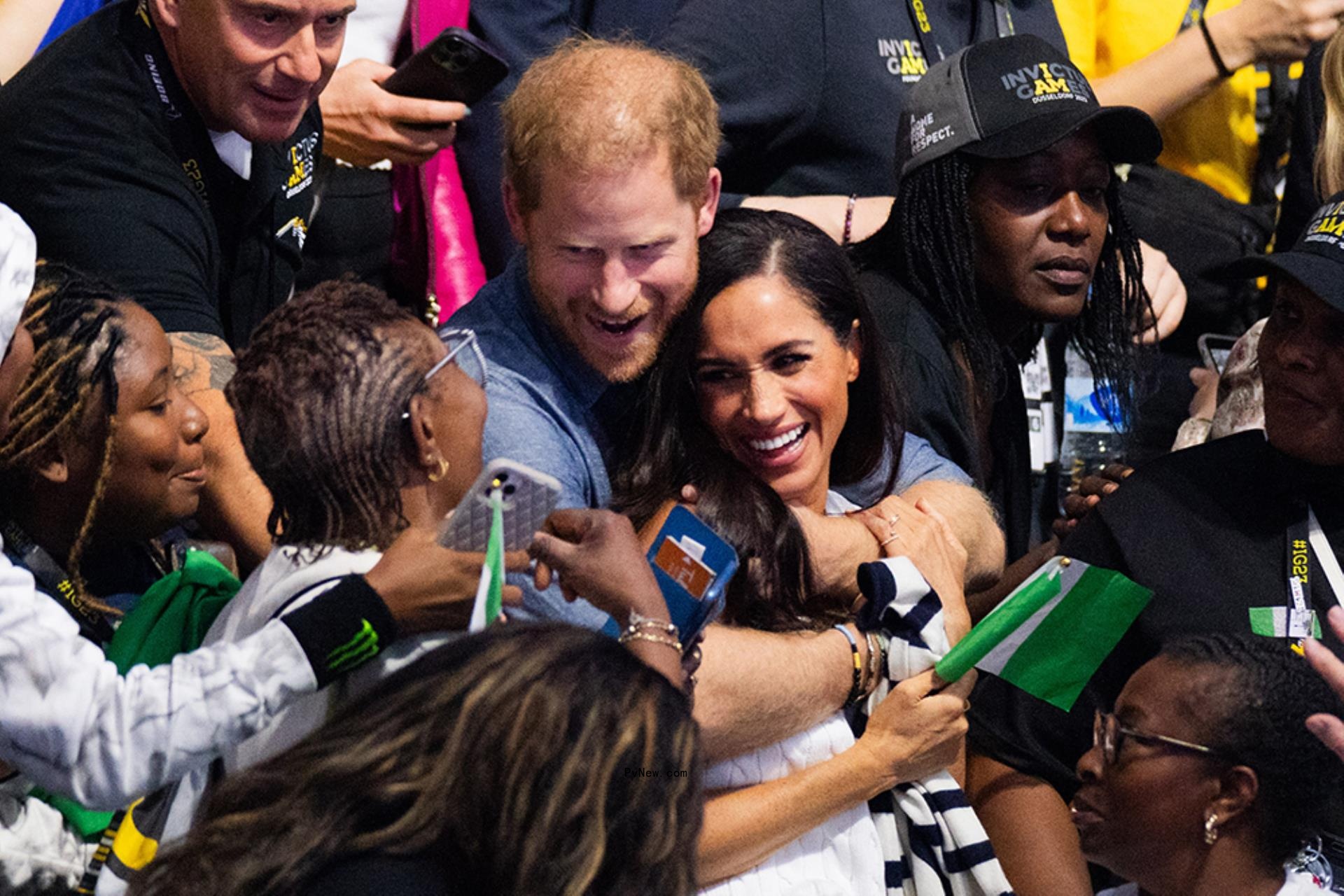 Prince Harry and Meghan Markle hugging