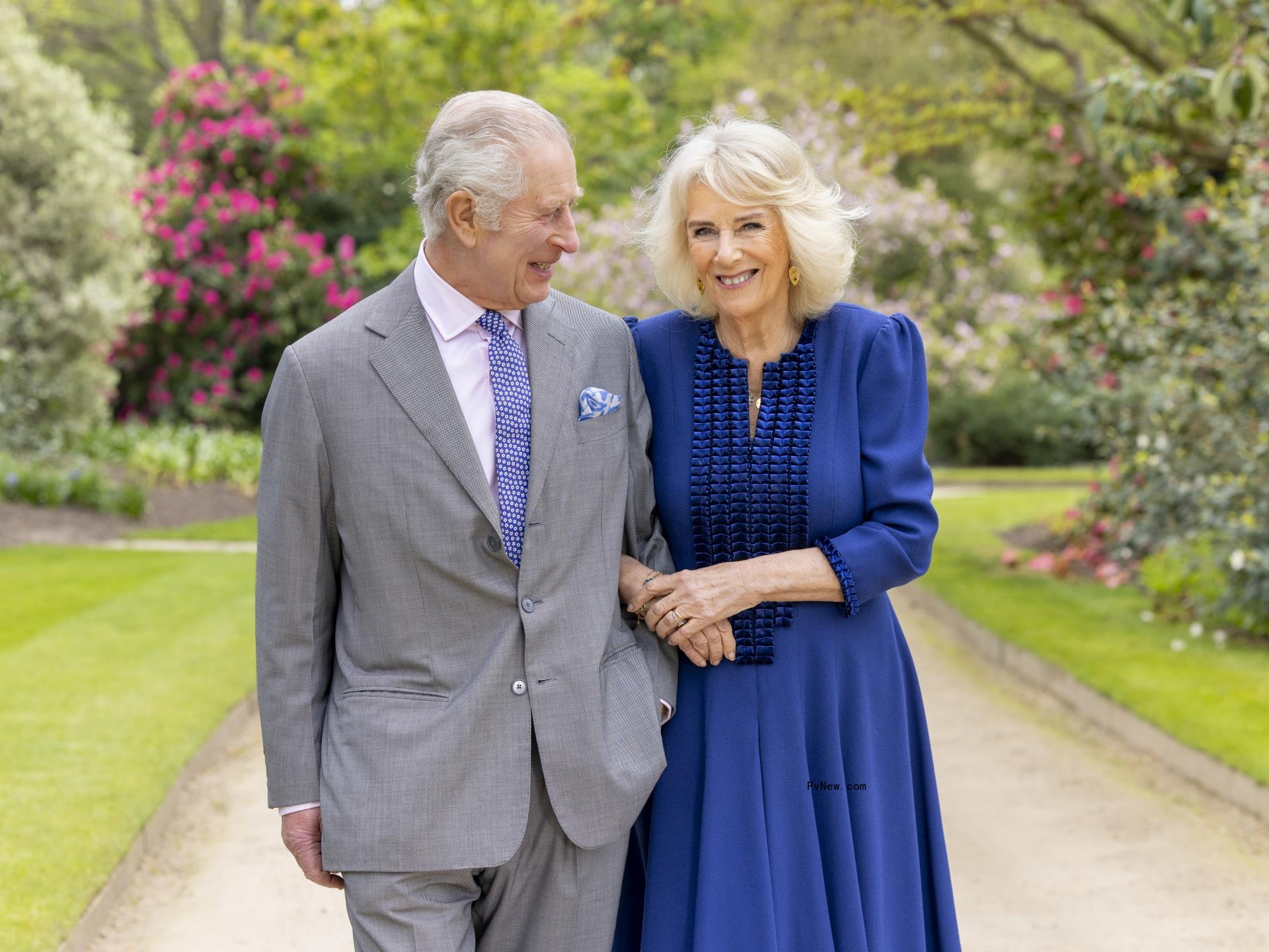 King Charles and Queen Camilla posing together 