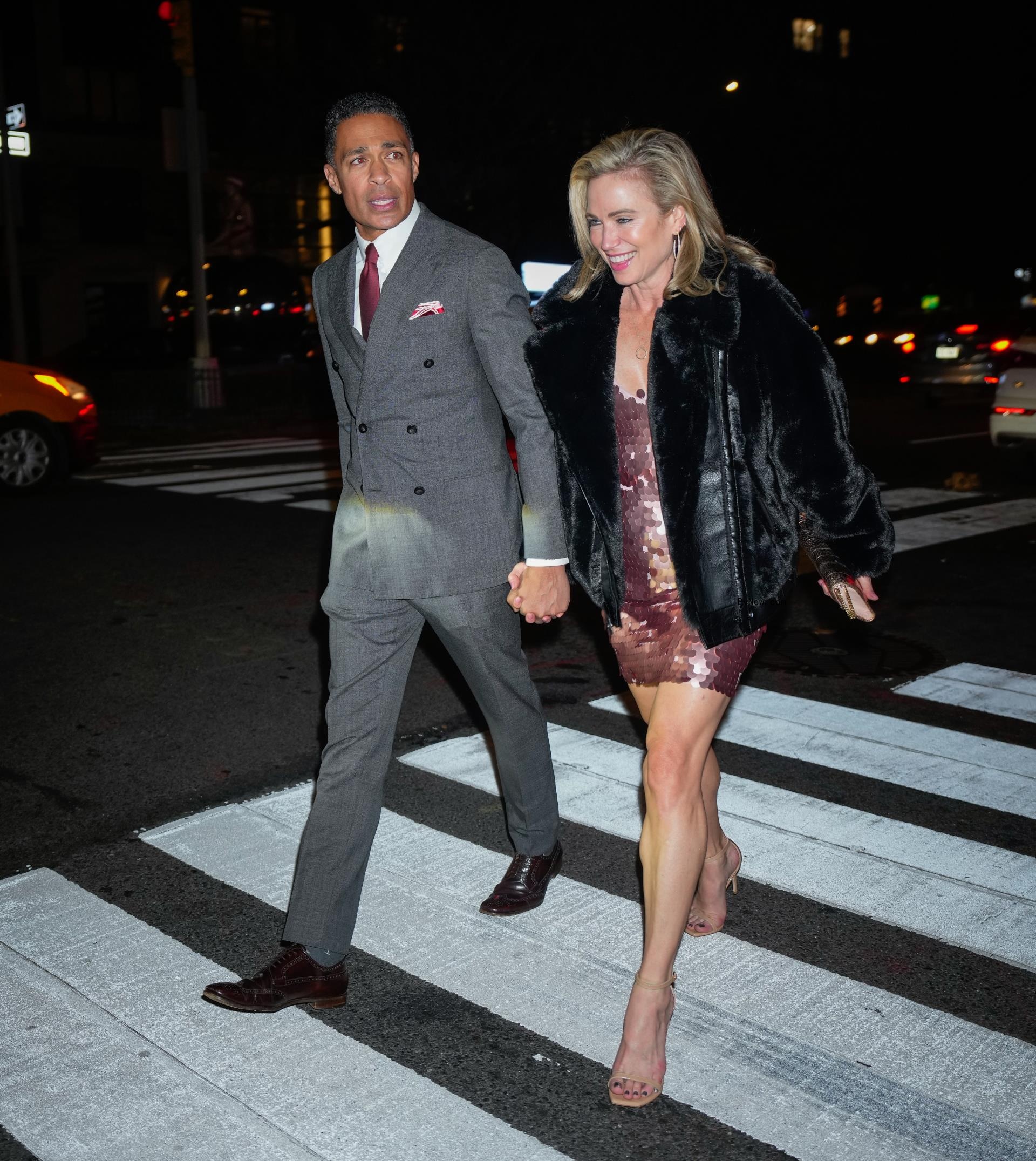 T.J. Holmes and Amy Robach.