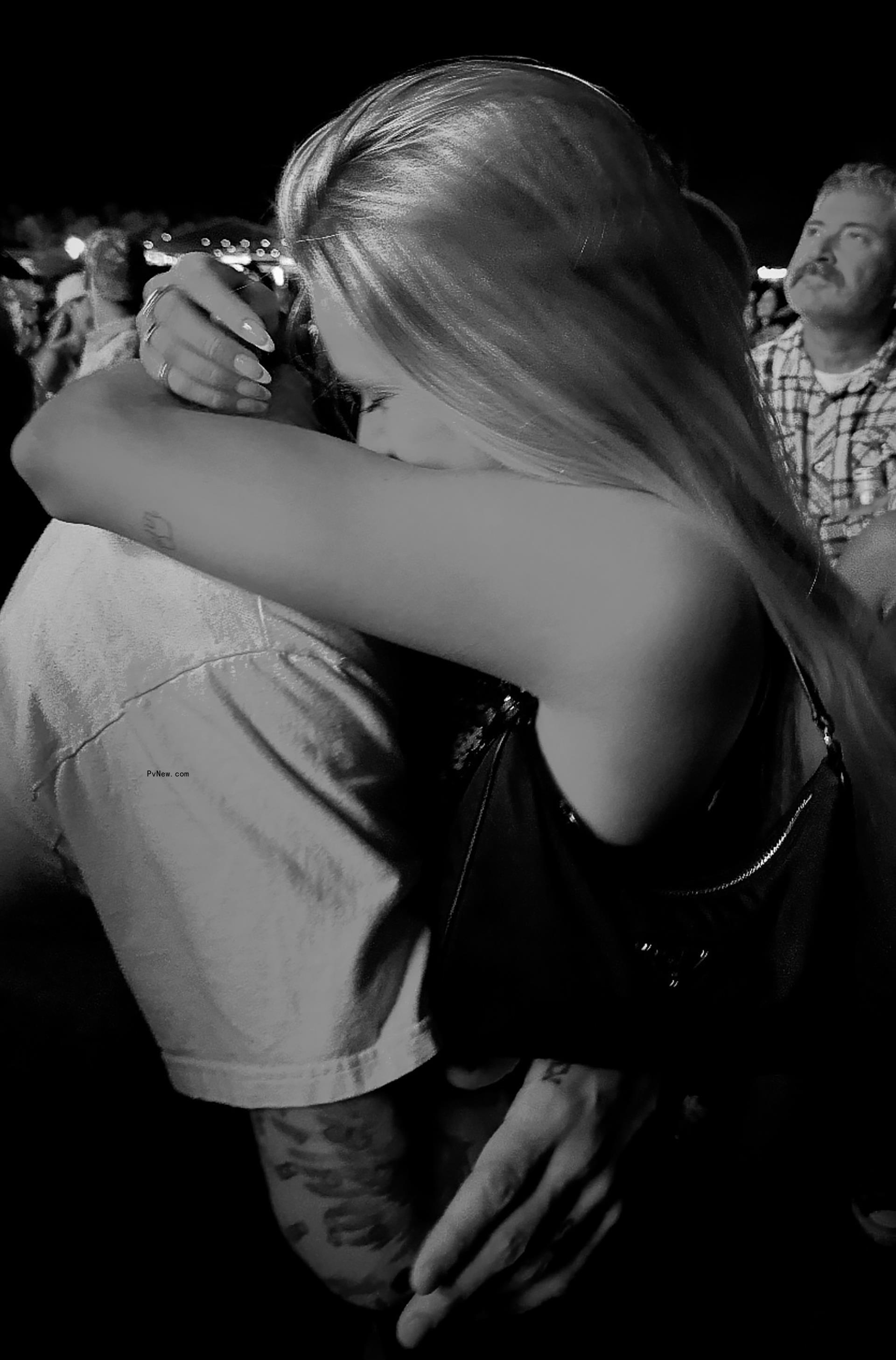 Johnny Manziel and Josie Canseco hugging intimately