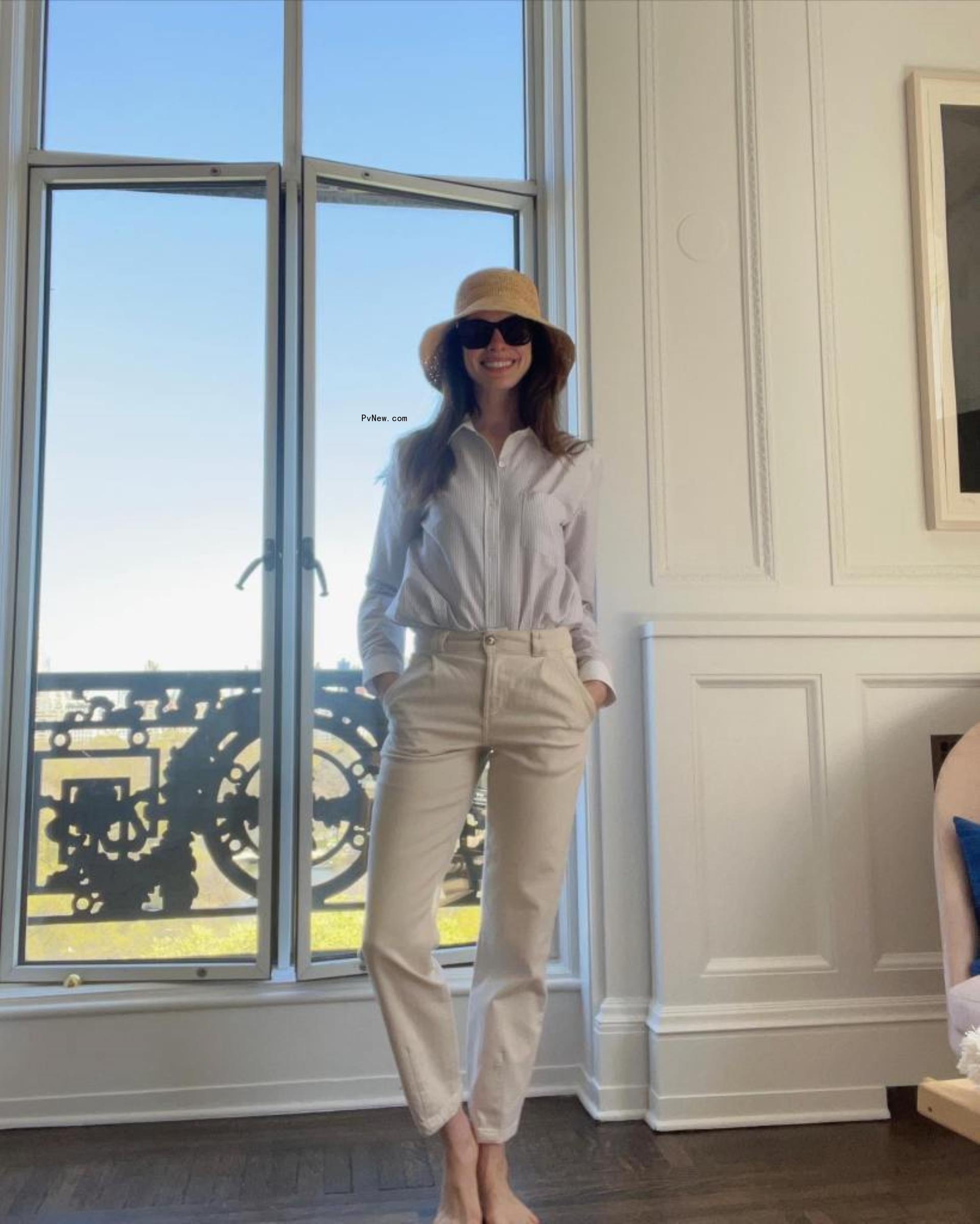 Anne Hathaway in a hat. 