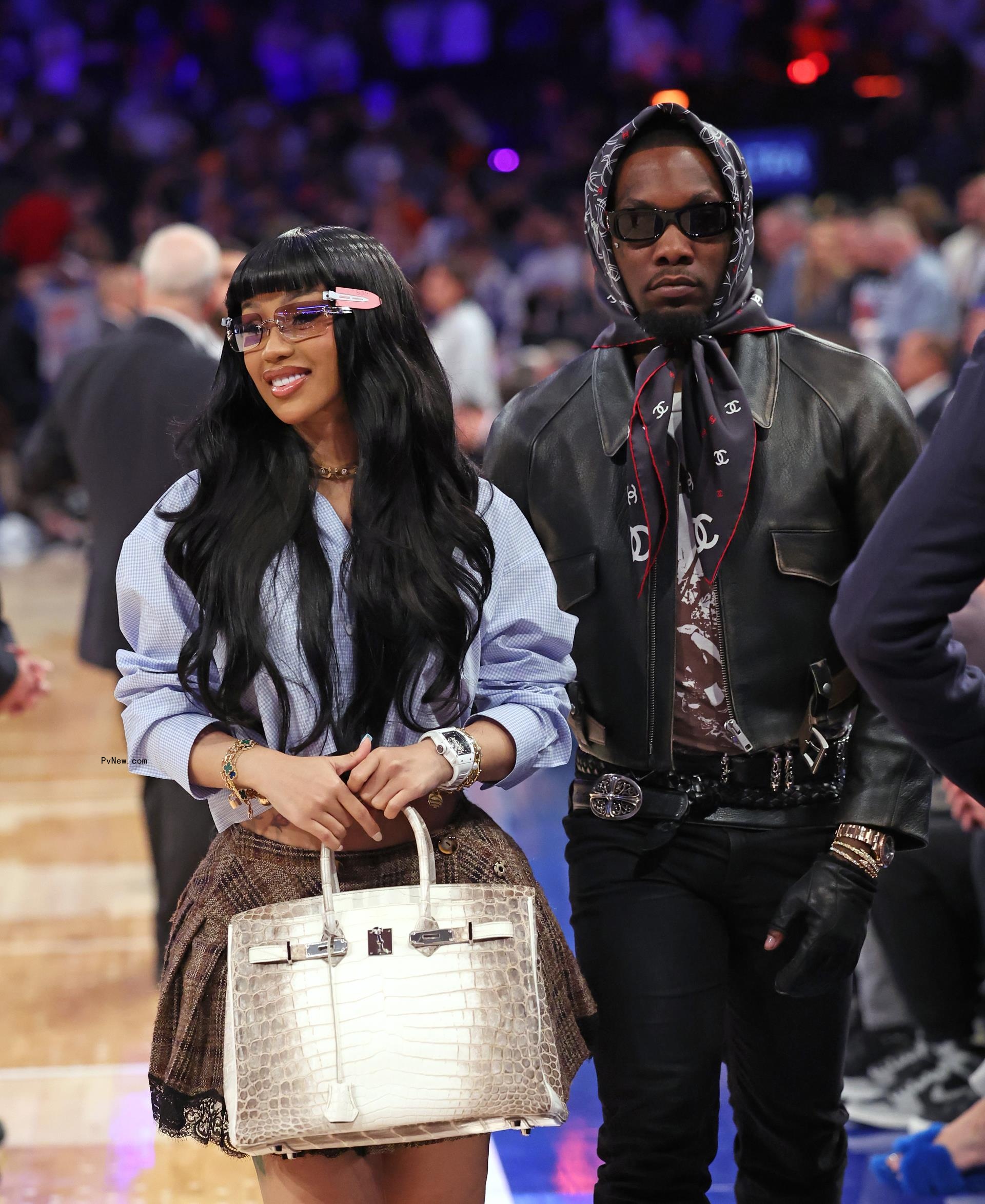 cardi b and offset walking court side at msg