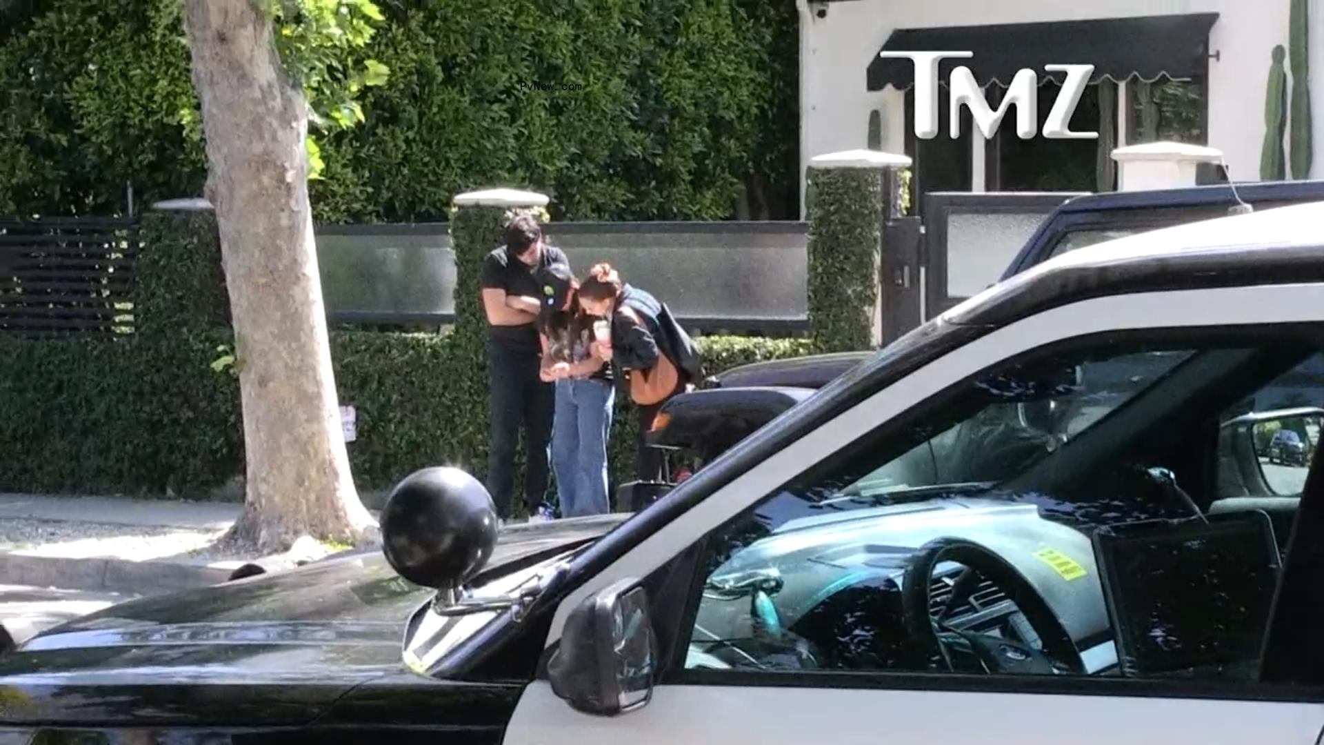 Kyle Richards and daughter Farrah Aldjufrie speaking to LAPD officers.
