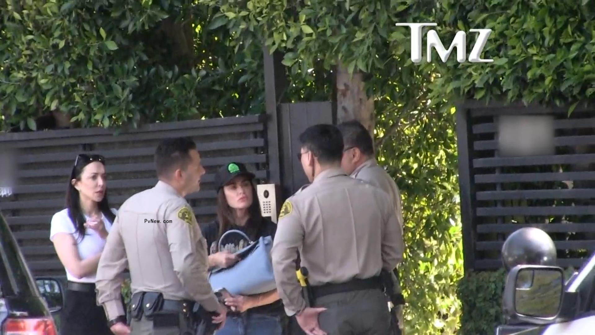 Kyle Richards and daughter Farrah Aldjufrie speaking to LAPD officers.