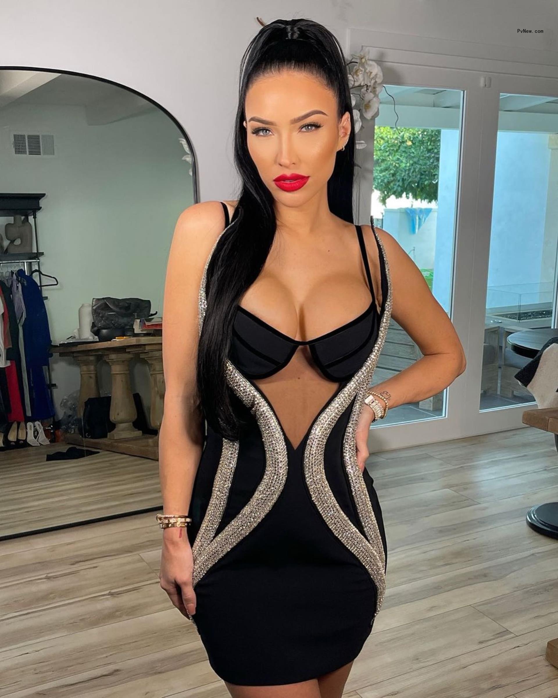 Bre Tiesi in a black dress.