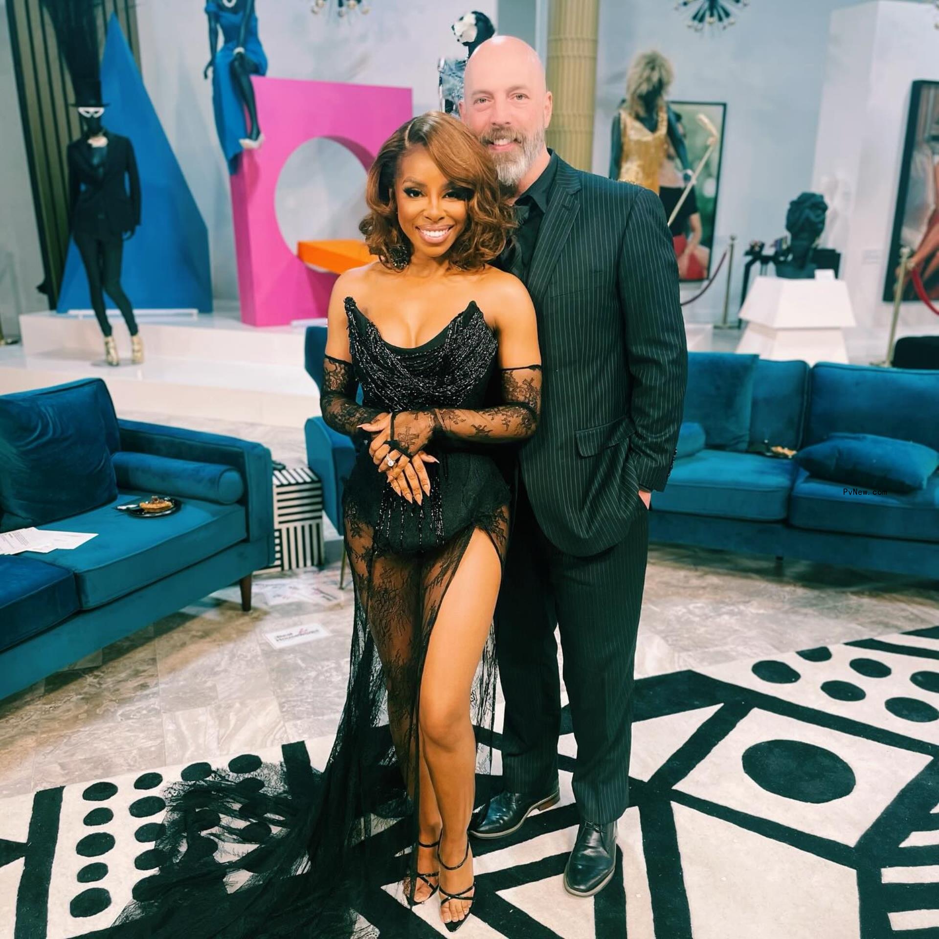 Candiace Dillard-Bassett and Chris Bassett posing together 