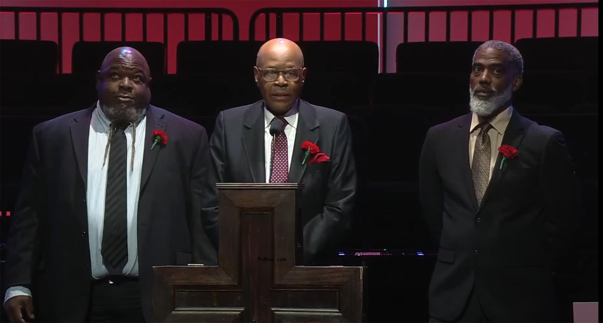 John Hundley speaking at his daughter's celebration of life service.