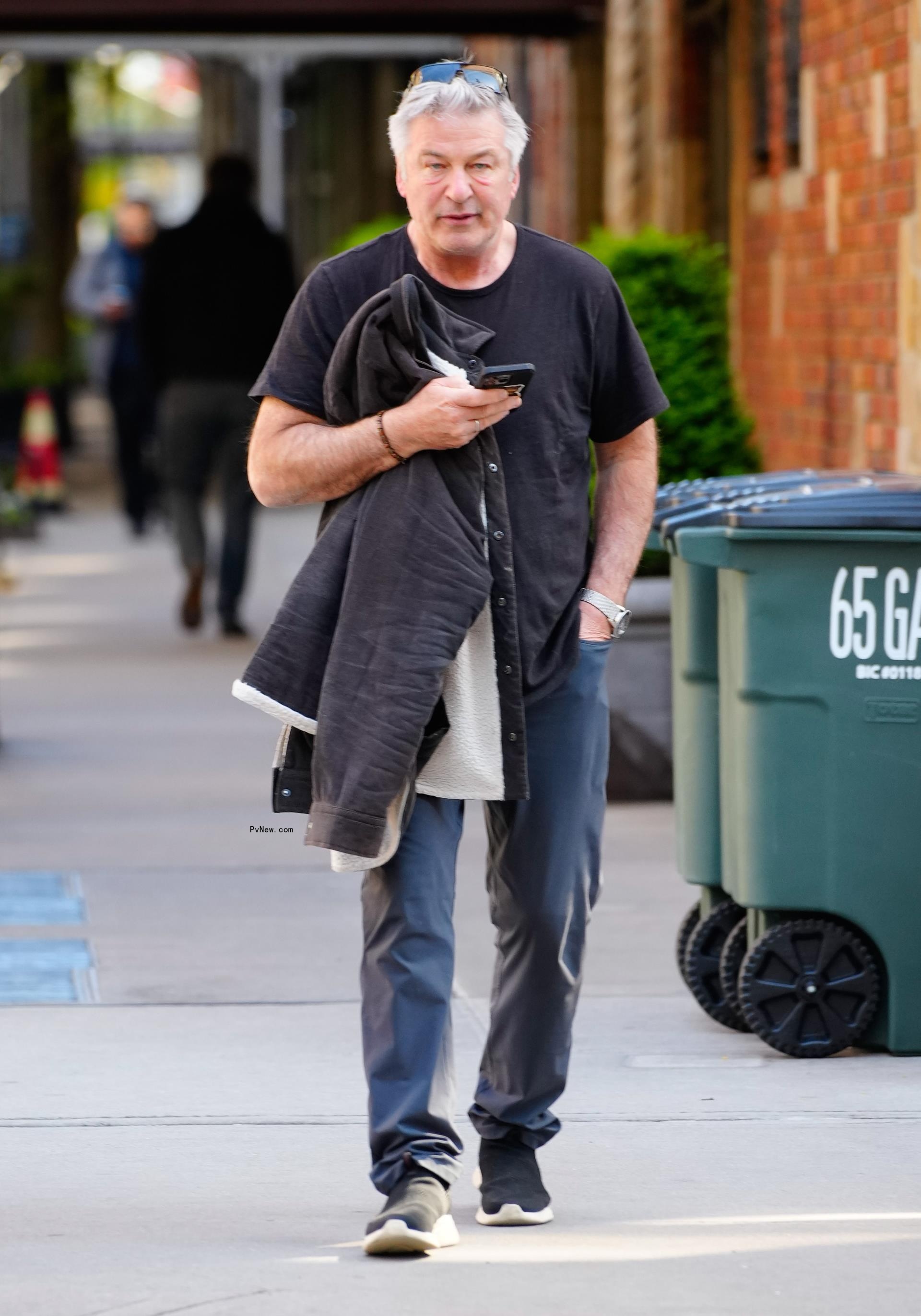 Alec Baldwin walking.