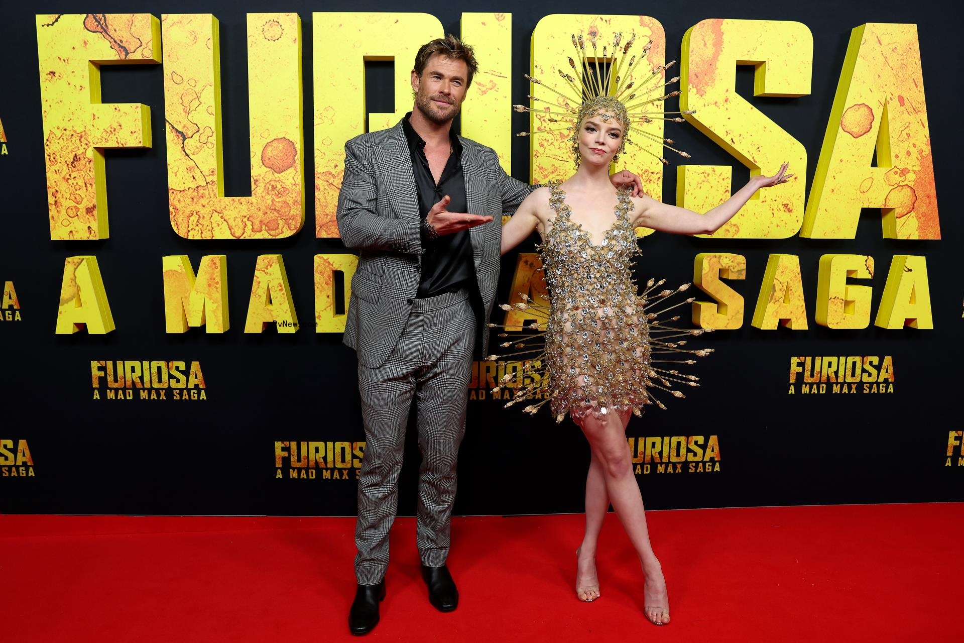 Chris Hemsworth and Anya Taylor-Joy wearing an arrow dress at the