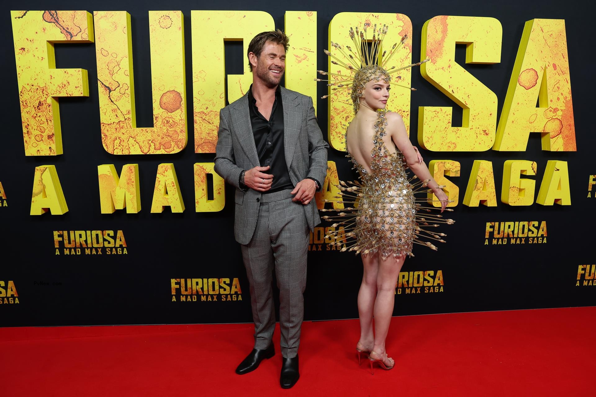 Chris Hemsworth and Anya Taylor-Joy wearing an arrow dress at the
