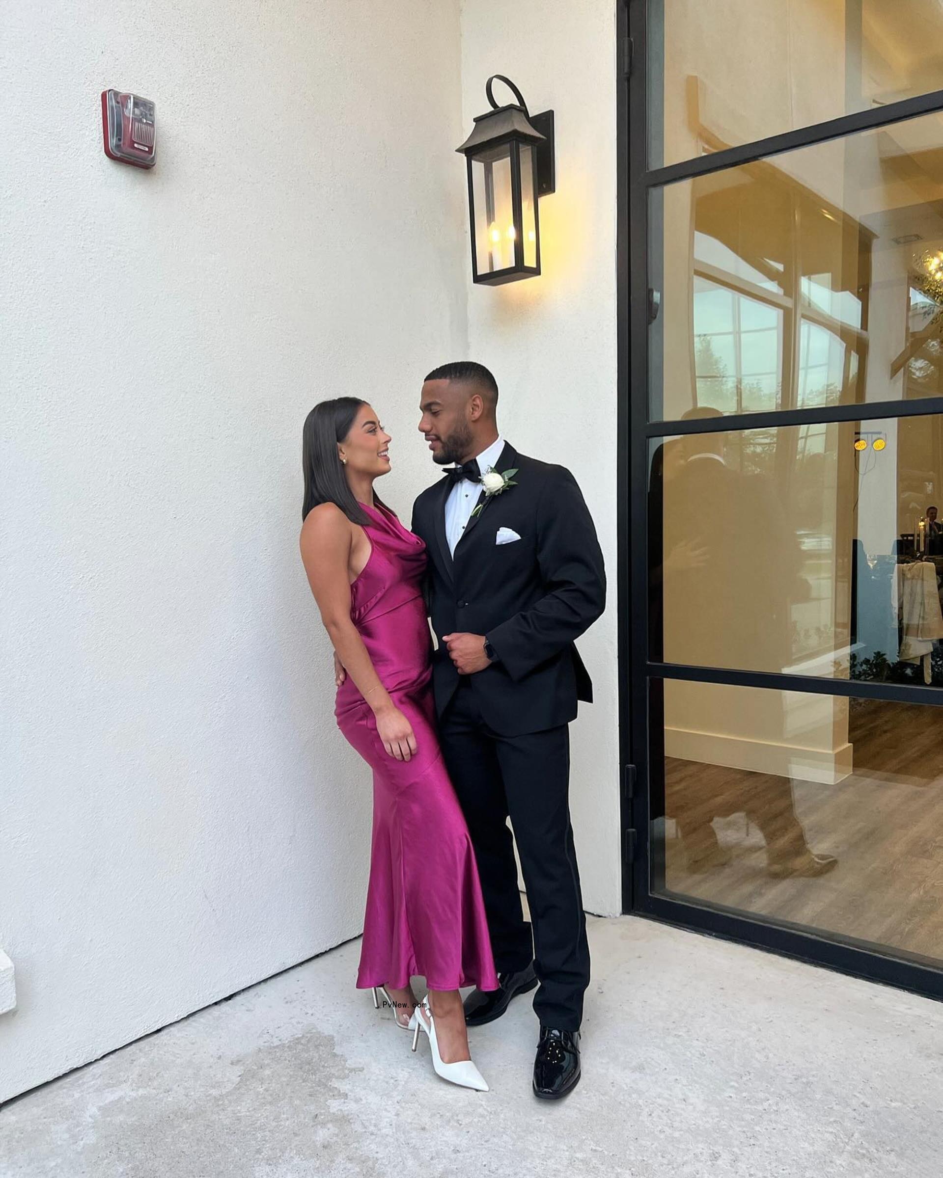Natalie Cortes and Amir Lancaster dressed uo.