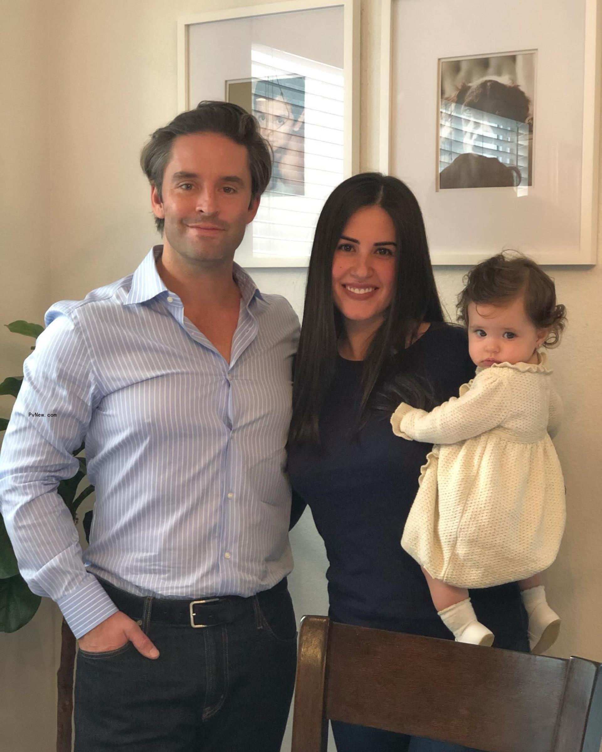 Jesse and Michelle Lally posing with daughter Isabella