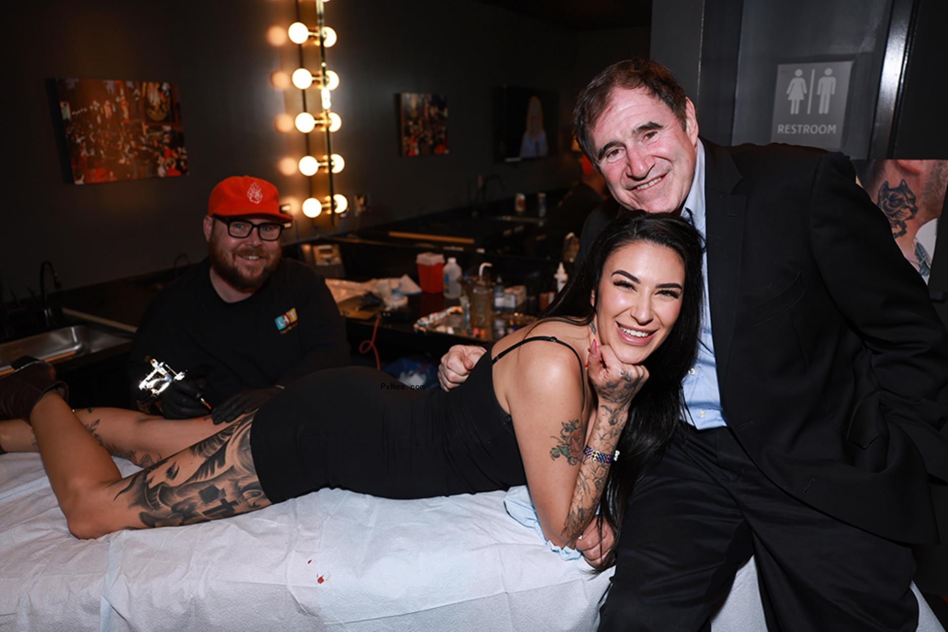 Richard Kind and Becca Calb at Netflix Is A Joke Festival with tattoo artist Ridge.